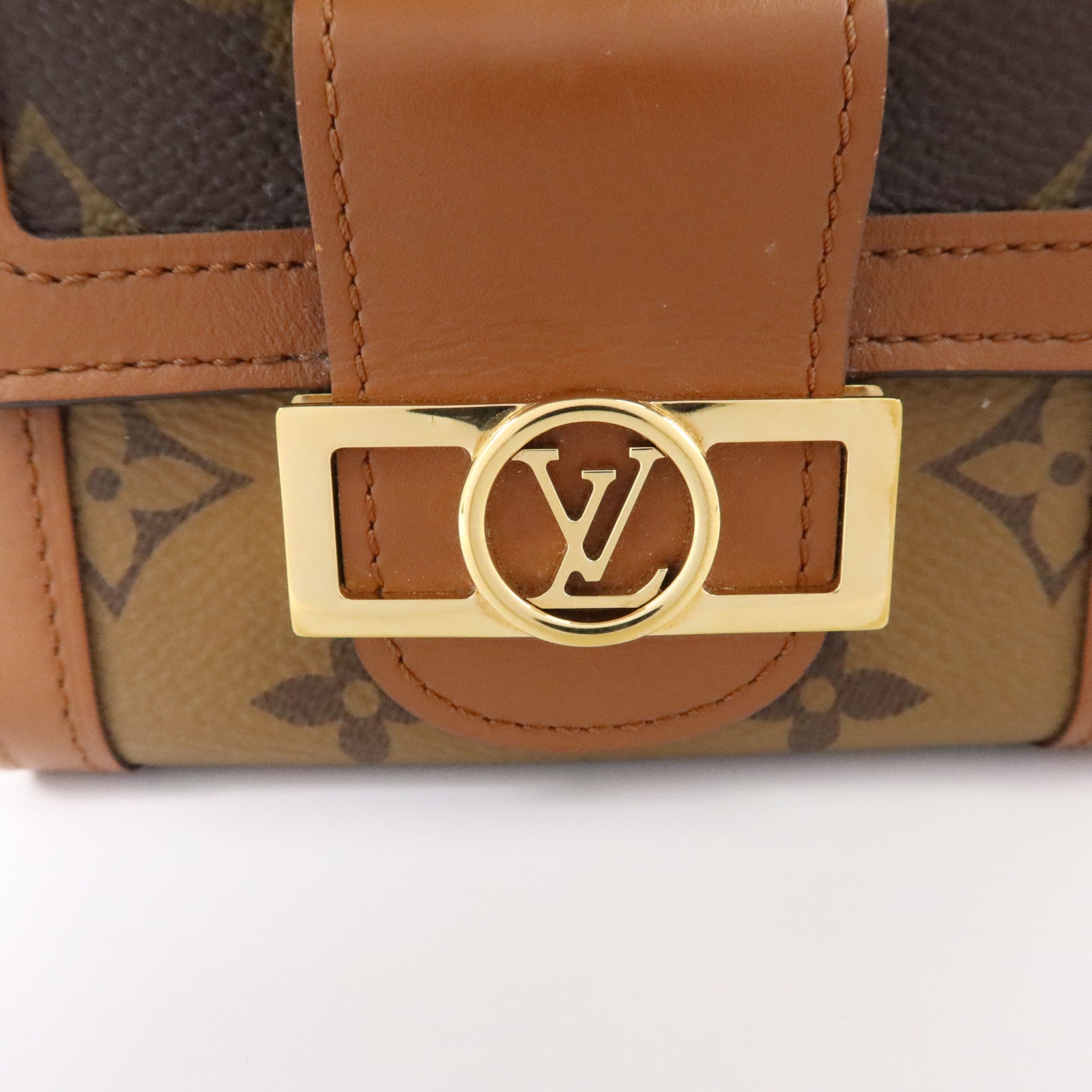 LOUIS VUITTON Monogram Reverse Micro Dauphine WOC金扣鏈帶肩背袋