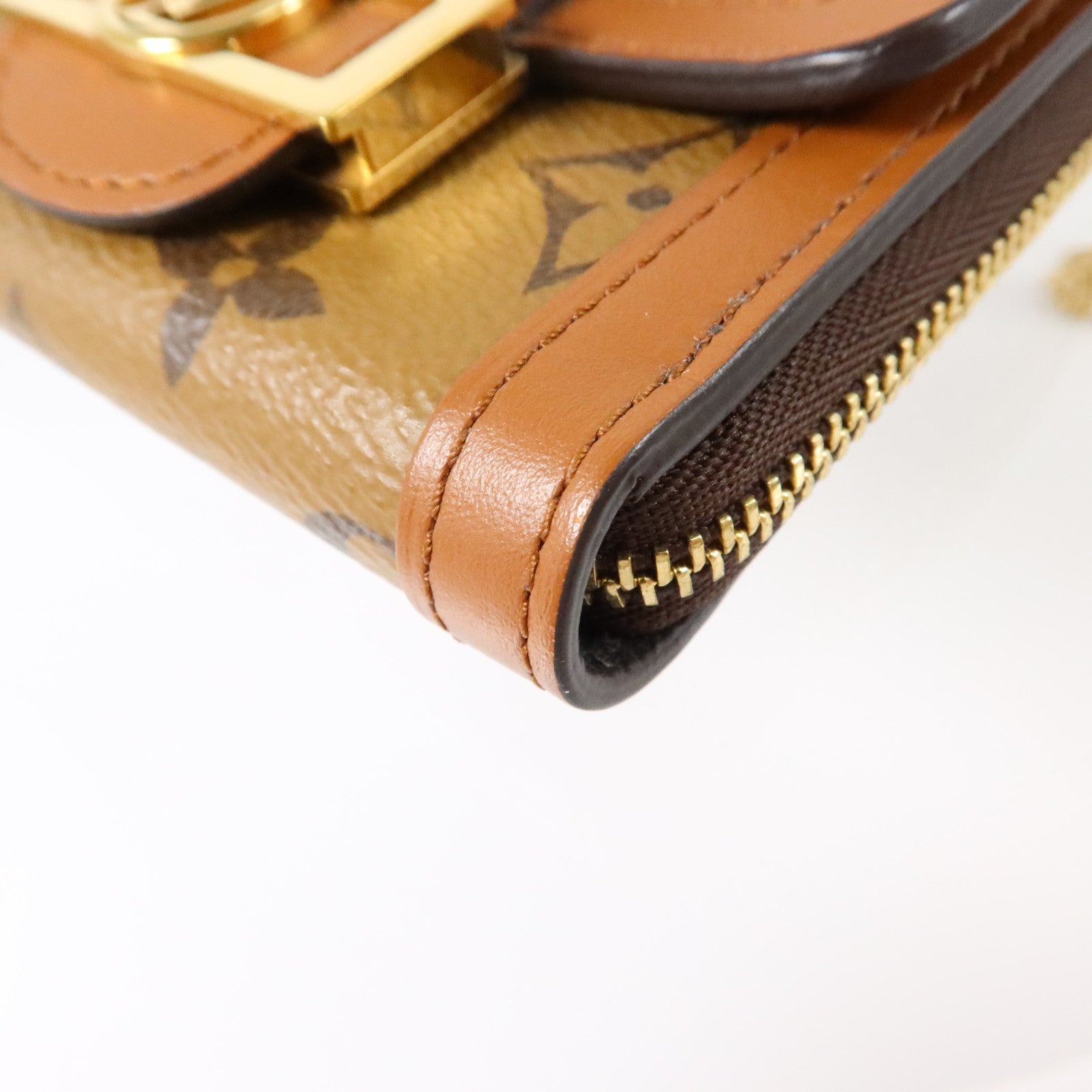 LOUIS VUITTON Monogram Reverse Micro Dauphine WOC金扣鏈帶肩背袋