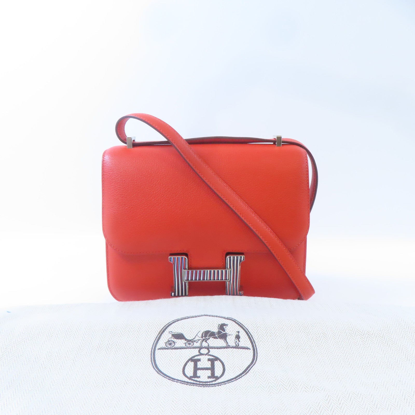 HERMES 【激減優惠】Evercolor皮革Mini Constance銀扣肩背袋Capucine/螢光橘色