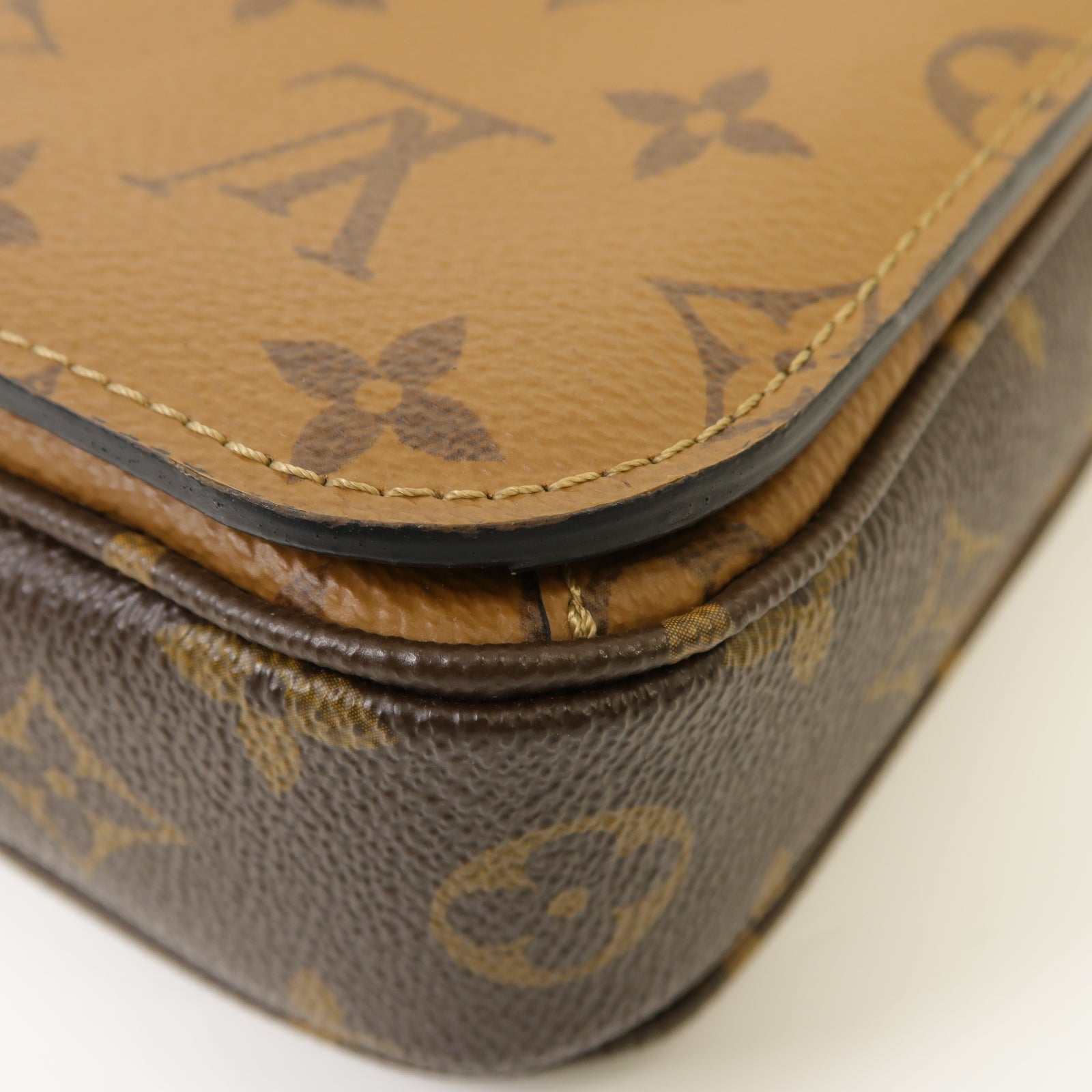 LOUIS VUITTON Monogram Reverse Pochette Metis金扣手挽肩背兩用袋啡色