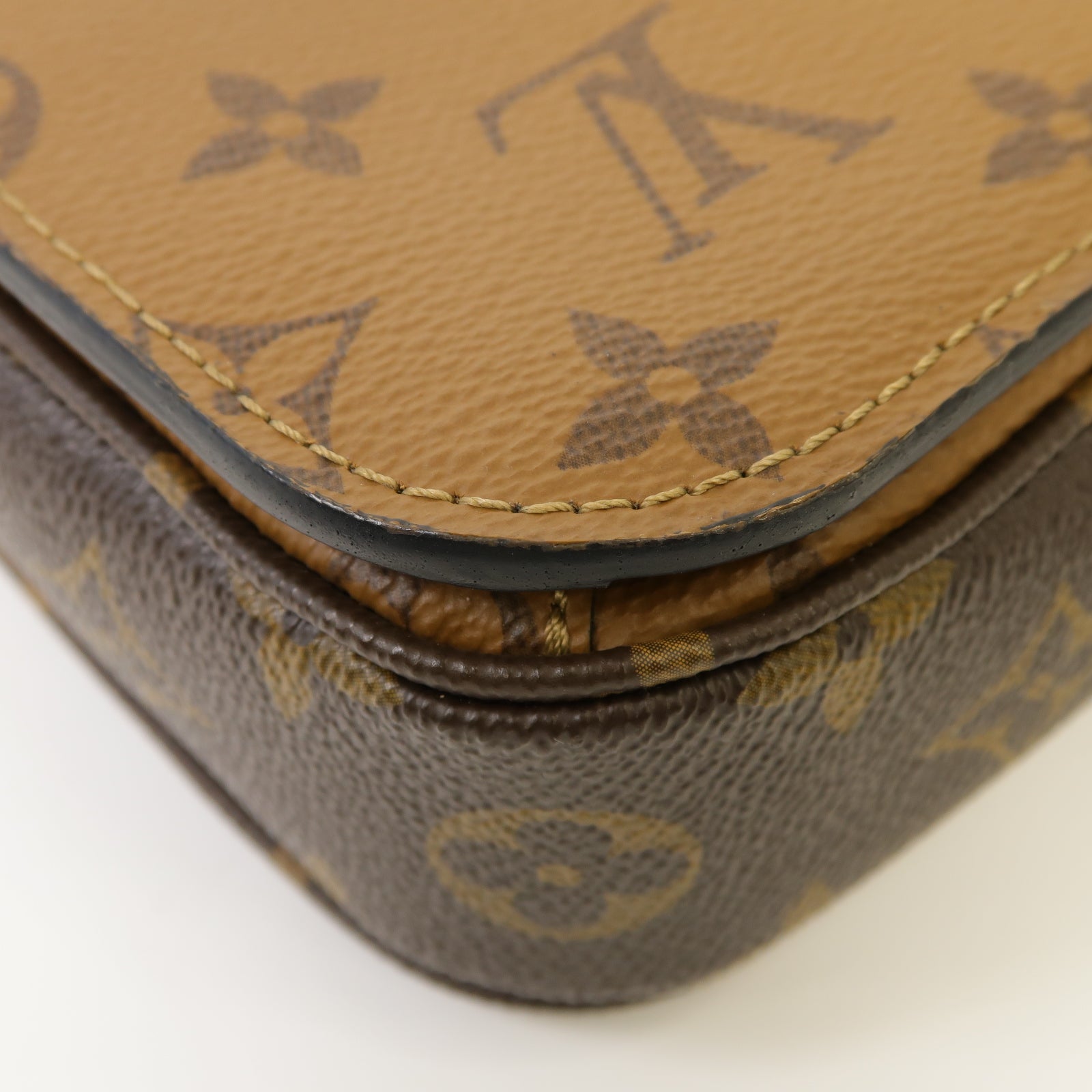 LOUIS VUITTON Monogram Reverse Pochette Metis金扣手挽肩背兩用袋啡色