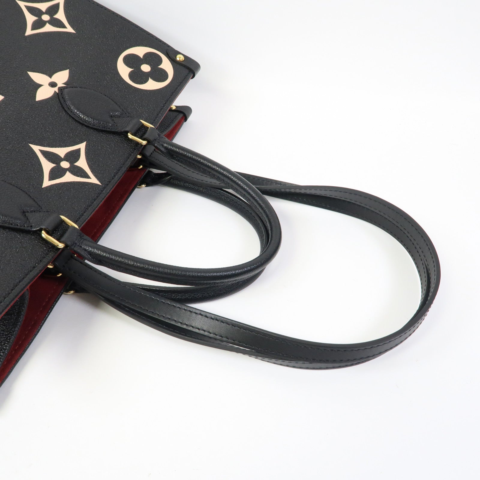 LOUIS VUITTON Monogram Empreinte OnTheGo MM金扣手挽肩背兩用袋黑色/白色
