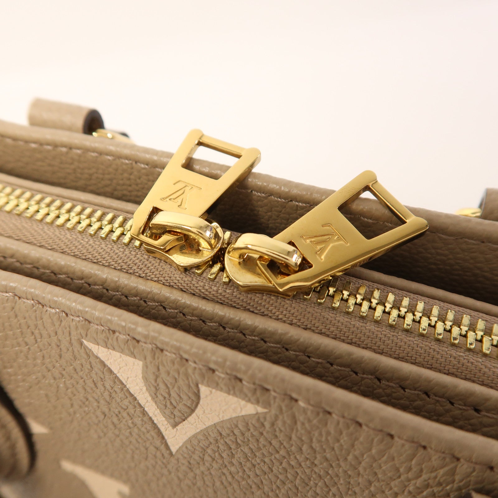 LOUIS VUITTON Monogram Empreinte On The Go East West金扣手挽肩背兩用袋
