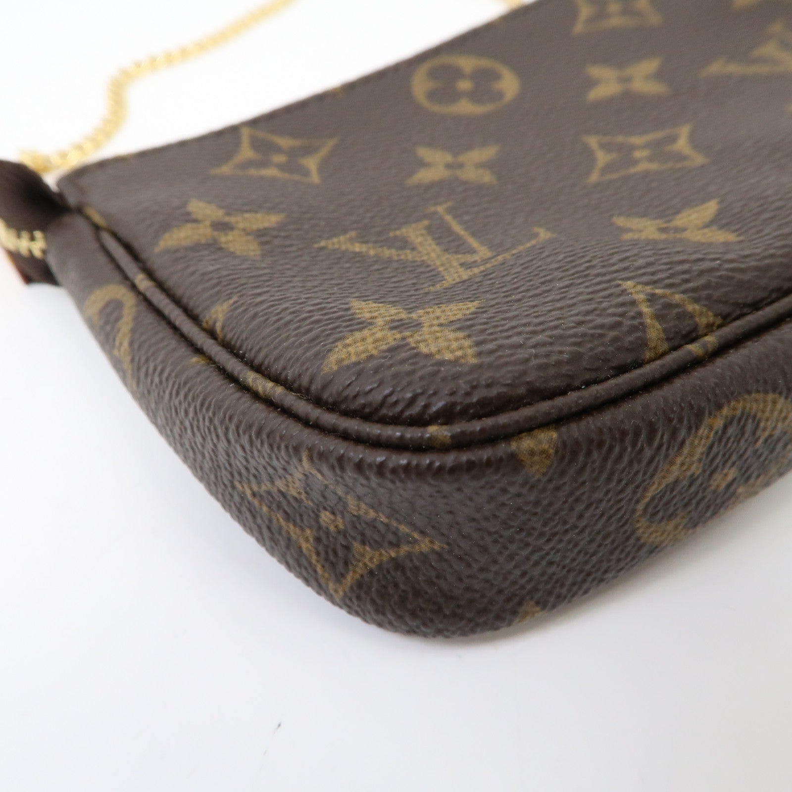 LOUIS VUITTON Monogram Mini Pochette Accessoires金扣手拿包啡色