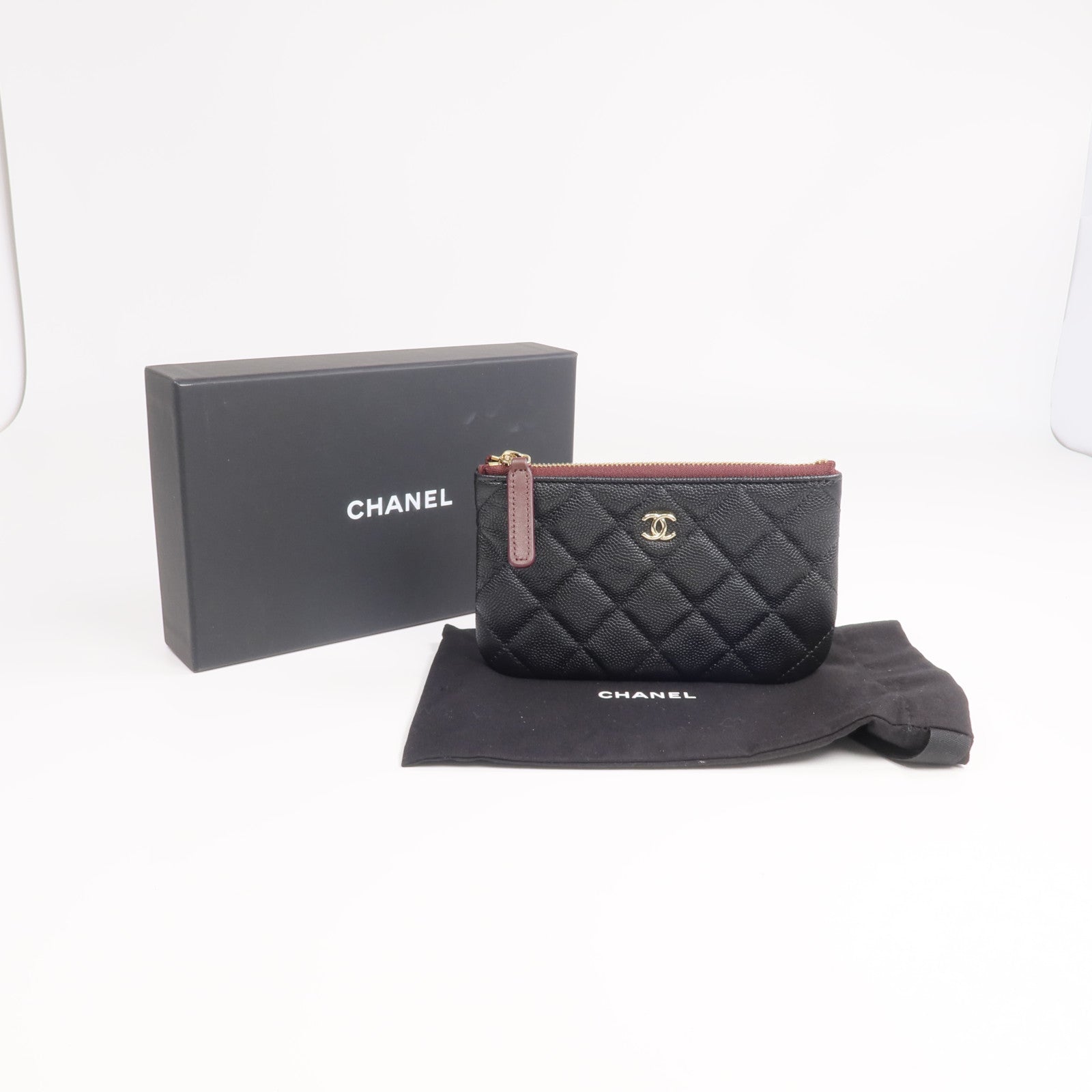 CHANEL 牛皮皮革Mini Pouch金扣手拿包