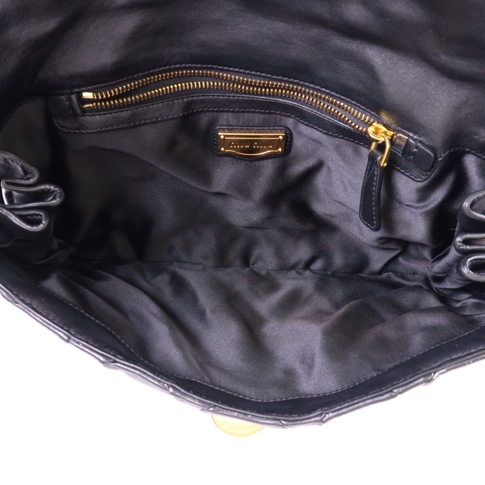 Miu Miu 牛皮皮革Clutch Bag金扣手拿包