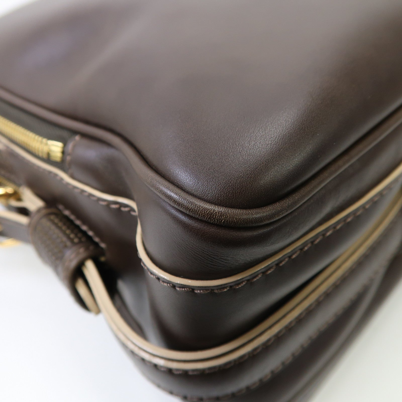 LOUIS VUITTON 皮革Bequia Trotter GM金扣手挽袋啡色