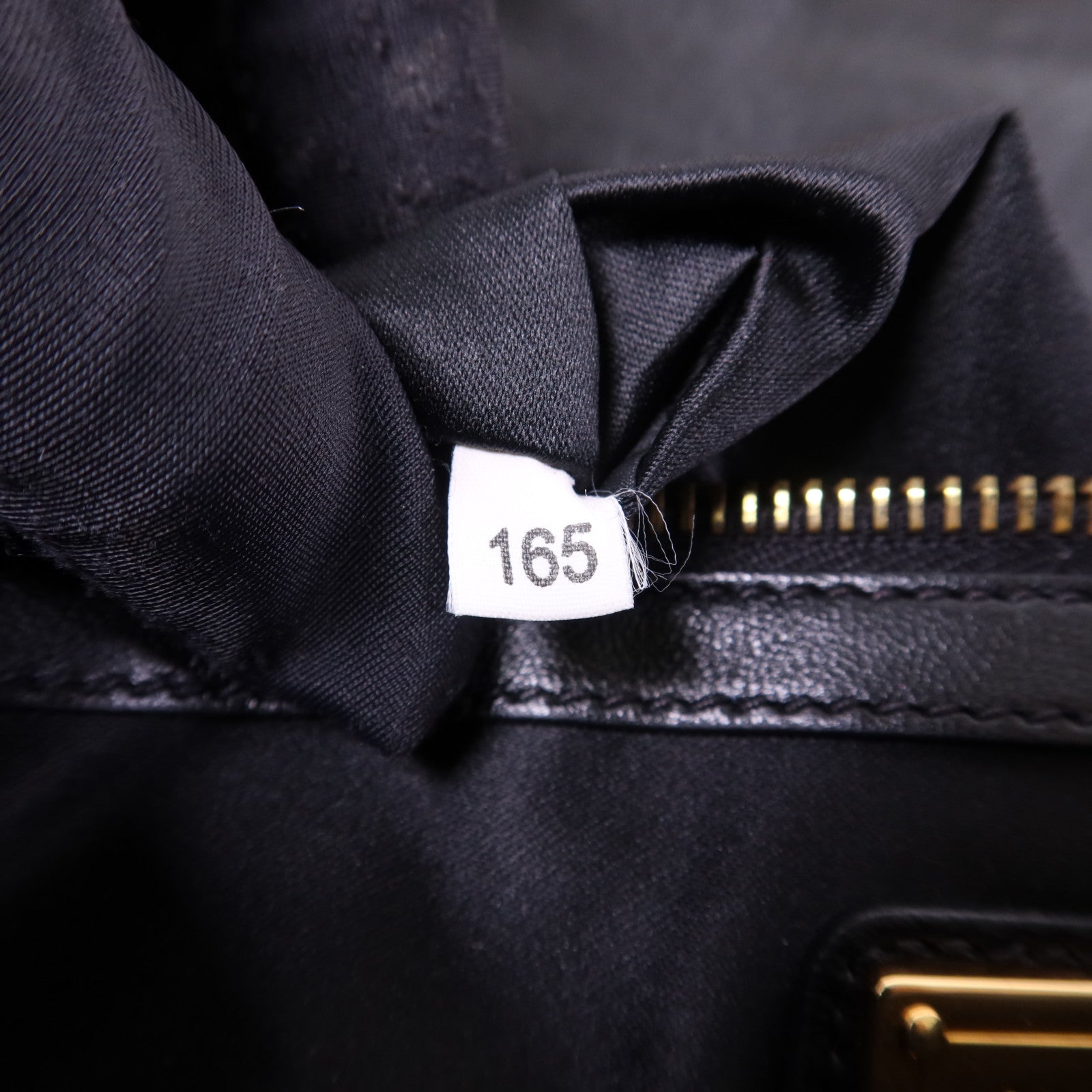 Miu Miu 牛皮皮革Clutch Bag金扣手拿包