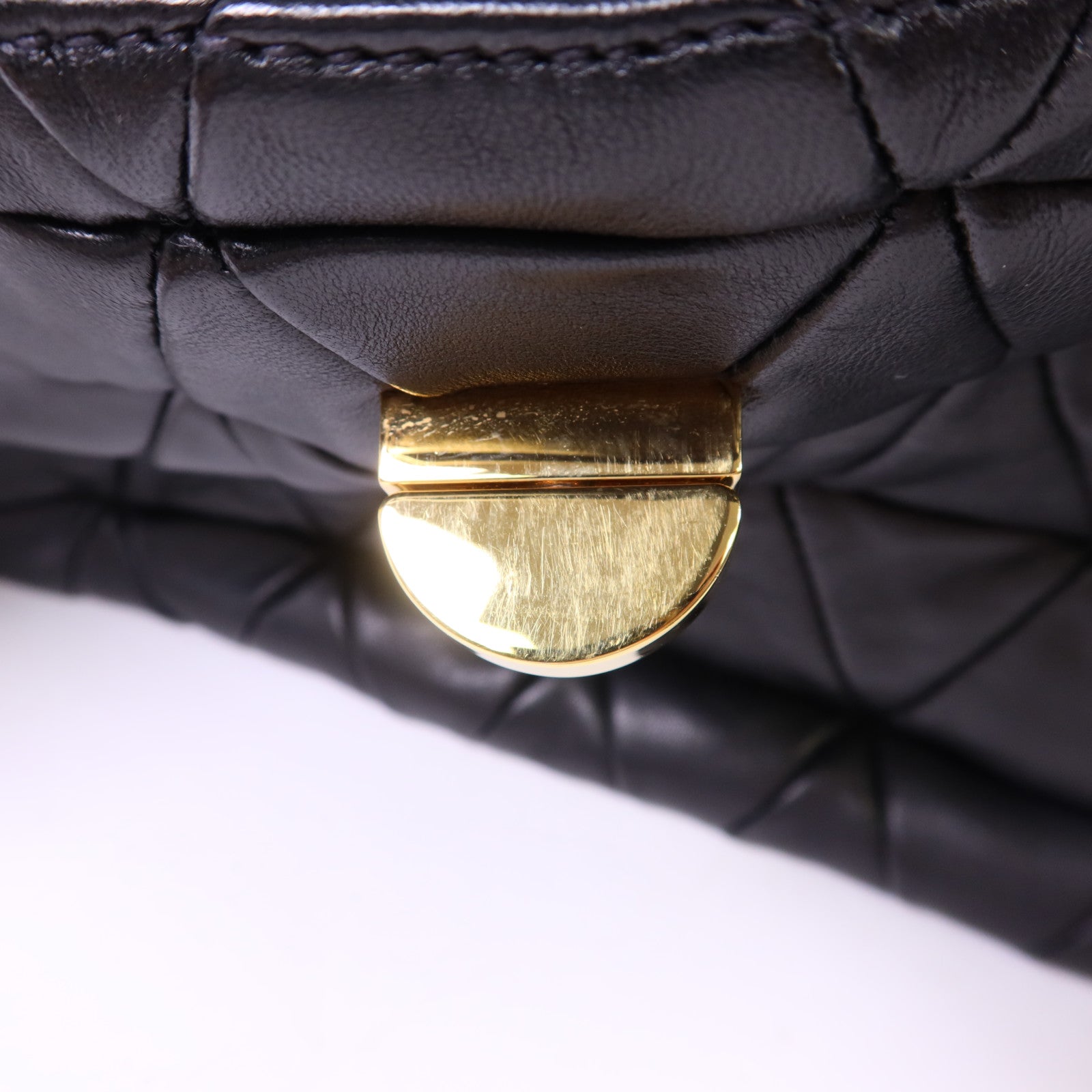 Miu Miu 牛皮皮革Clutch Bag金扣手拿包