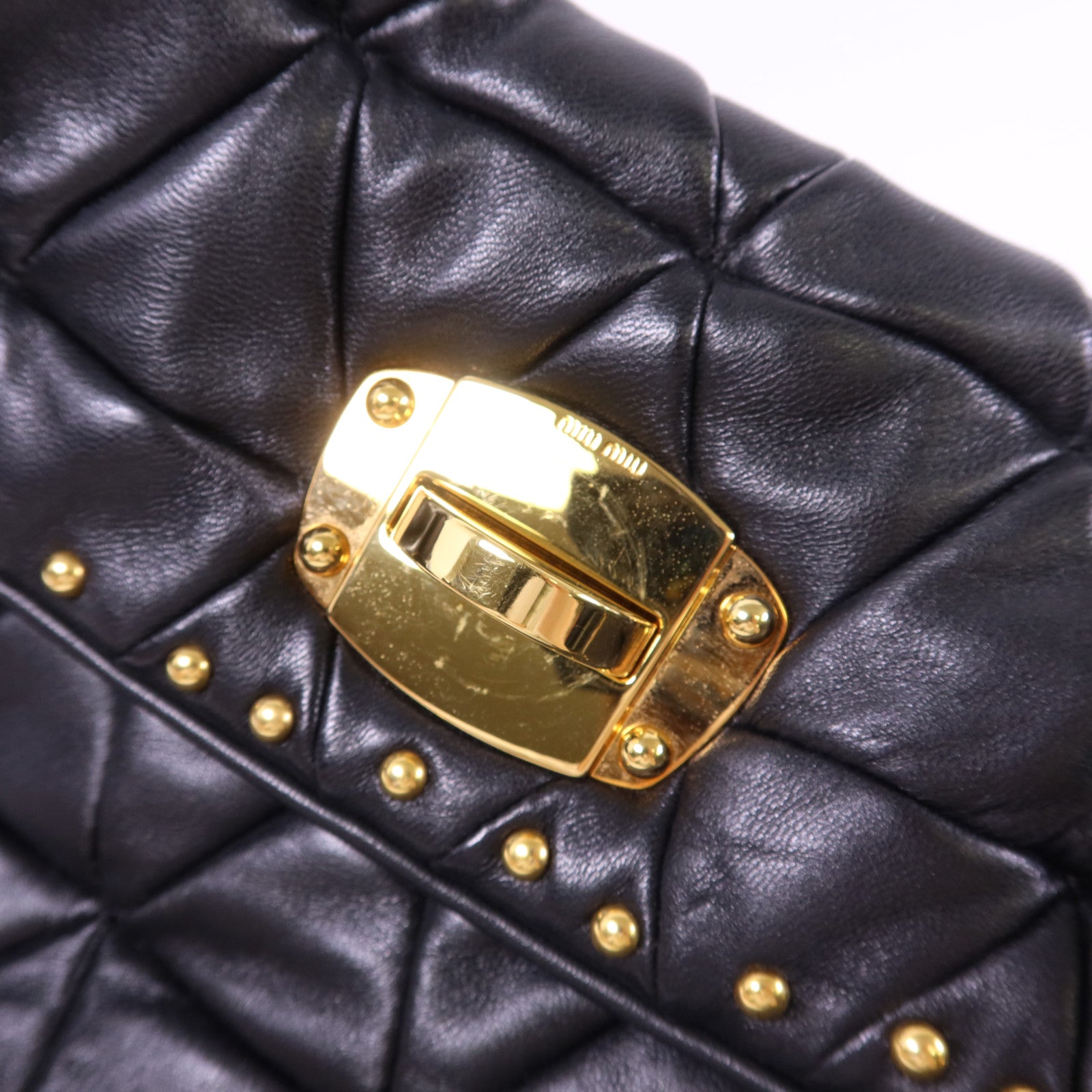 Miu Miu 牛皮皮革Clutch Bag金扣手拿包