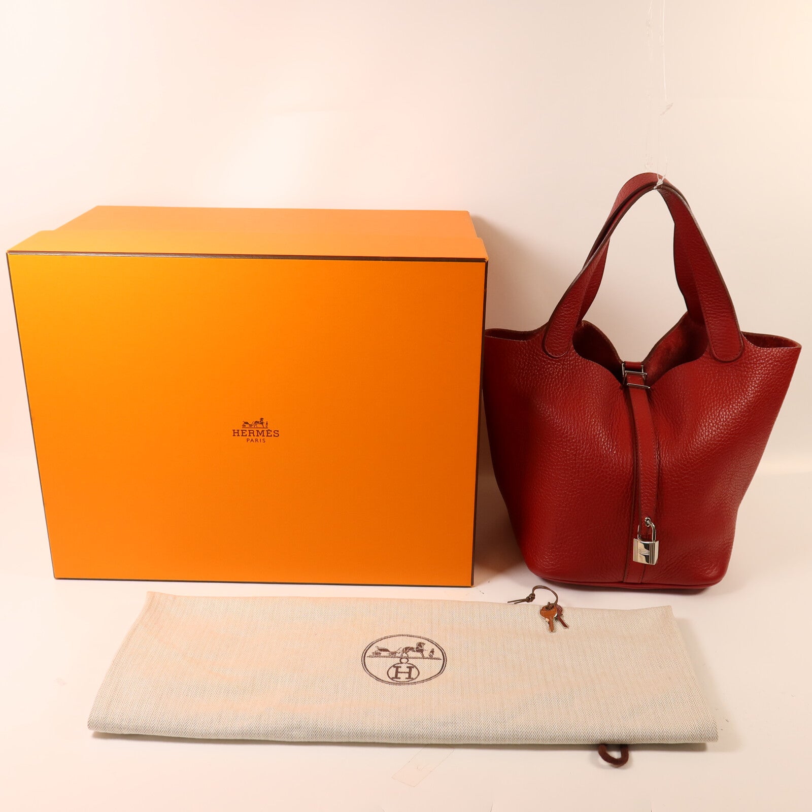 HERMES Clemence皮革Picotin MM扣手挽袋Rouge Garance