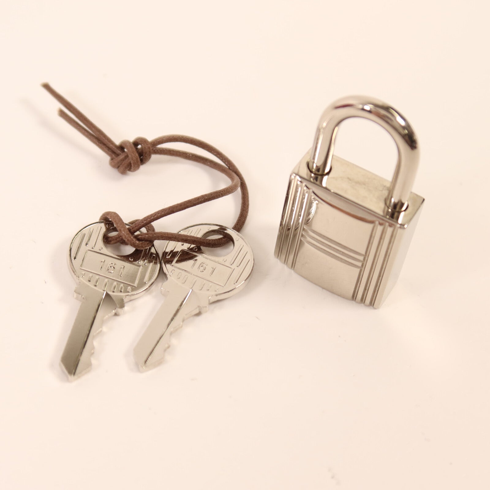 HERMES Clemence皮革Picotin MM扣手挽袋Rouge Garance