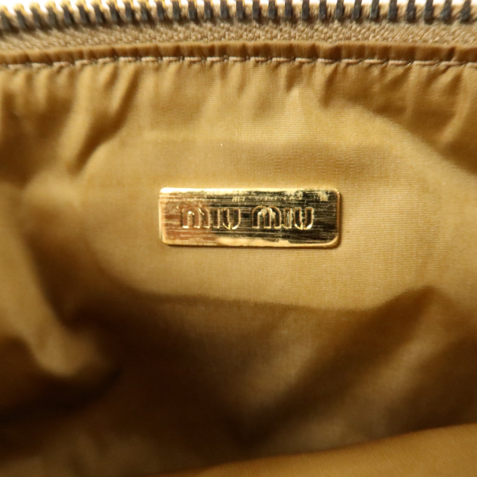 Miu Miu 蛇皮皮革Wristlet金扣手拿包