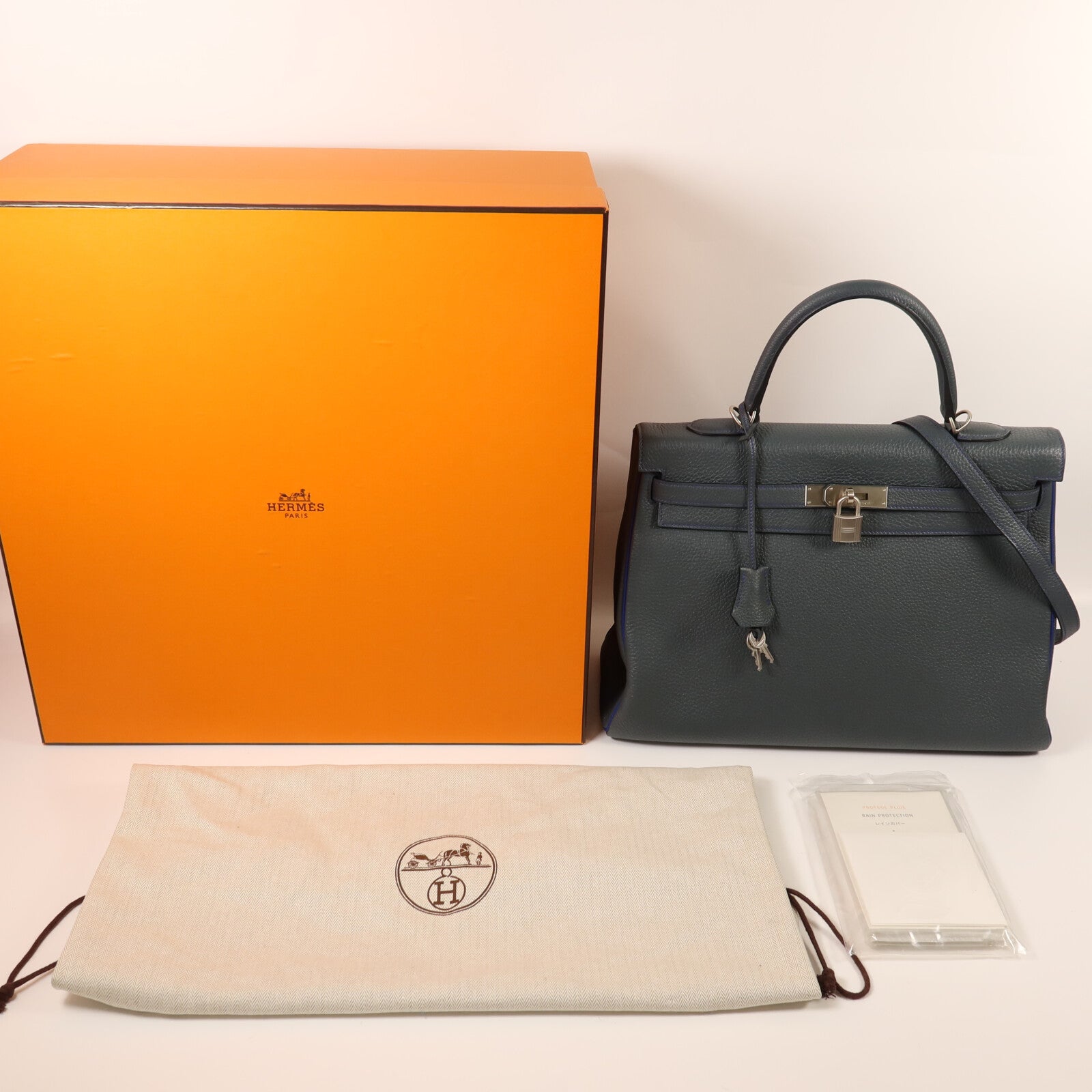HERMES Clemence皮革Kelly 32銀扣手挽袋Bleu Orage/Bleu Electrique