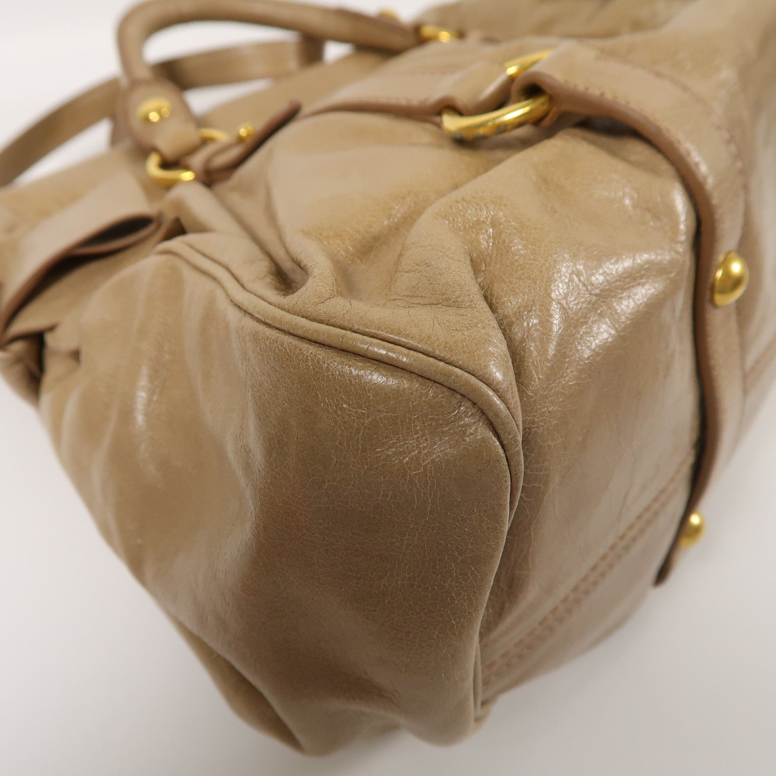 Miu Miu 牛皮皮革Vitello Lux金扣肩背袋棕色
