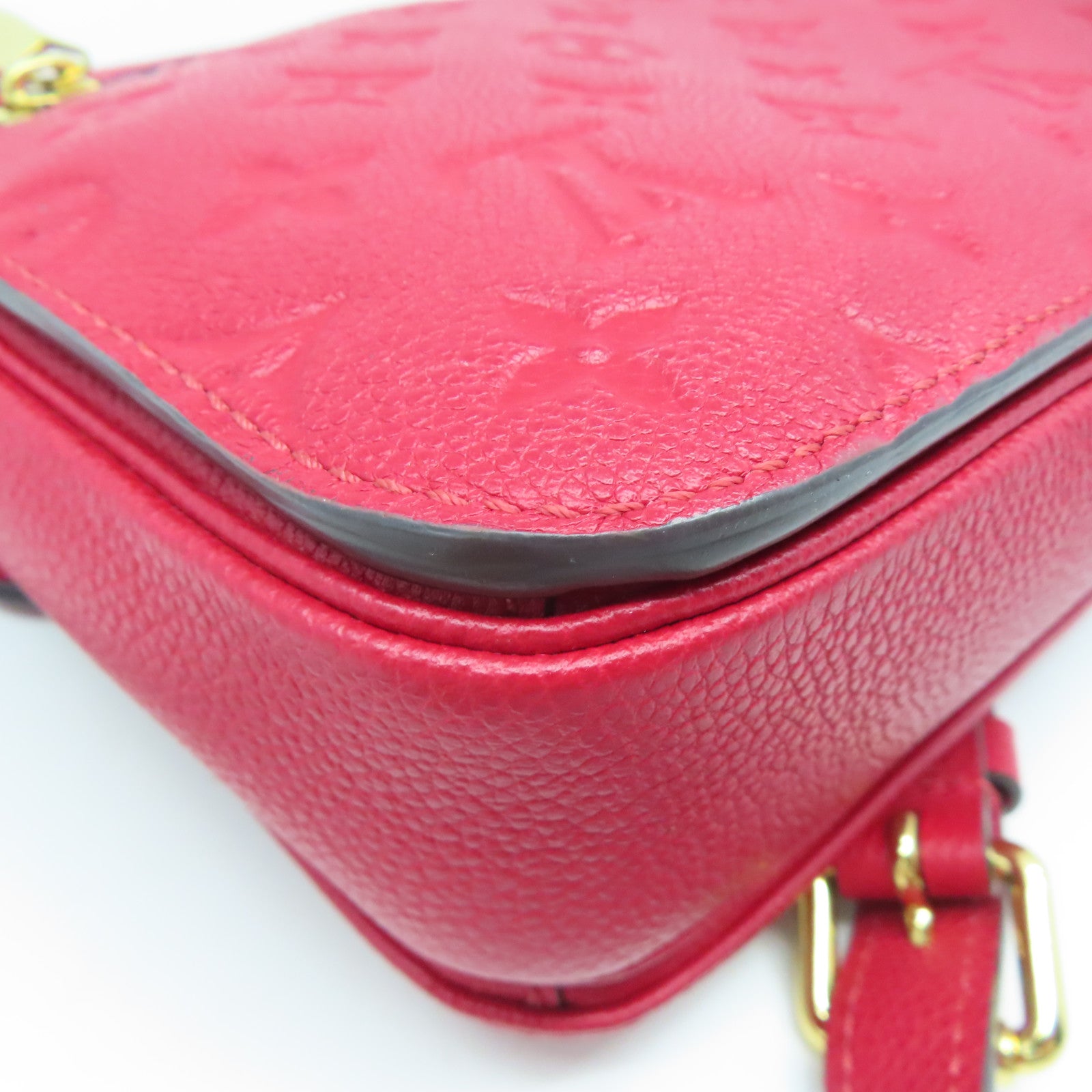 LOUIS VUITTON Monogram Empreinte Pochette Metis金扣手挽肩背兩用袋紅色