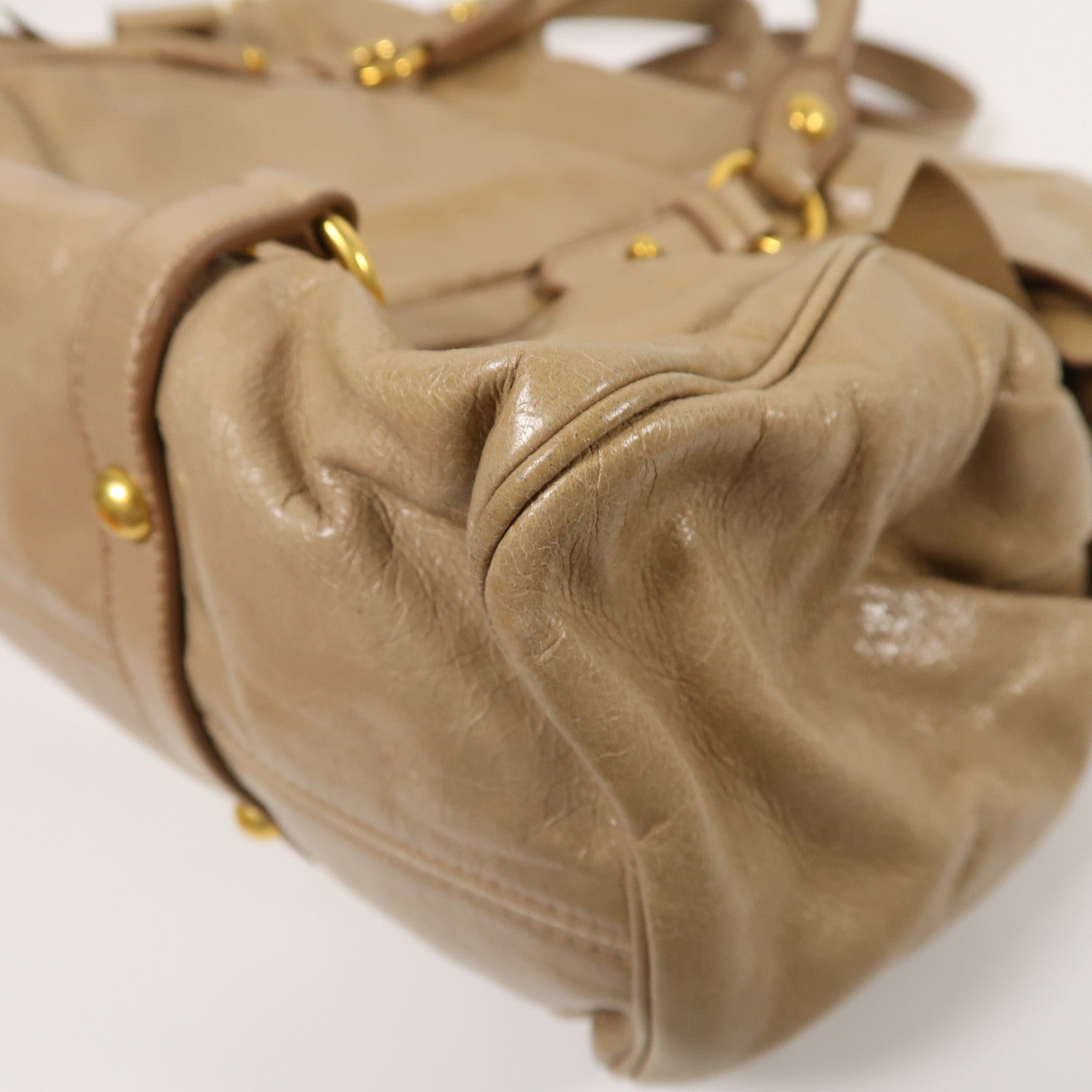Miu Miu 牛皮皮革Vitello Lux金扣肩背袋棕色