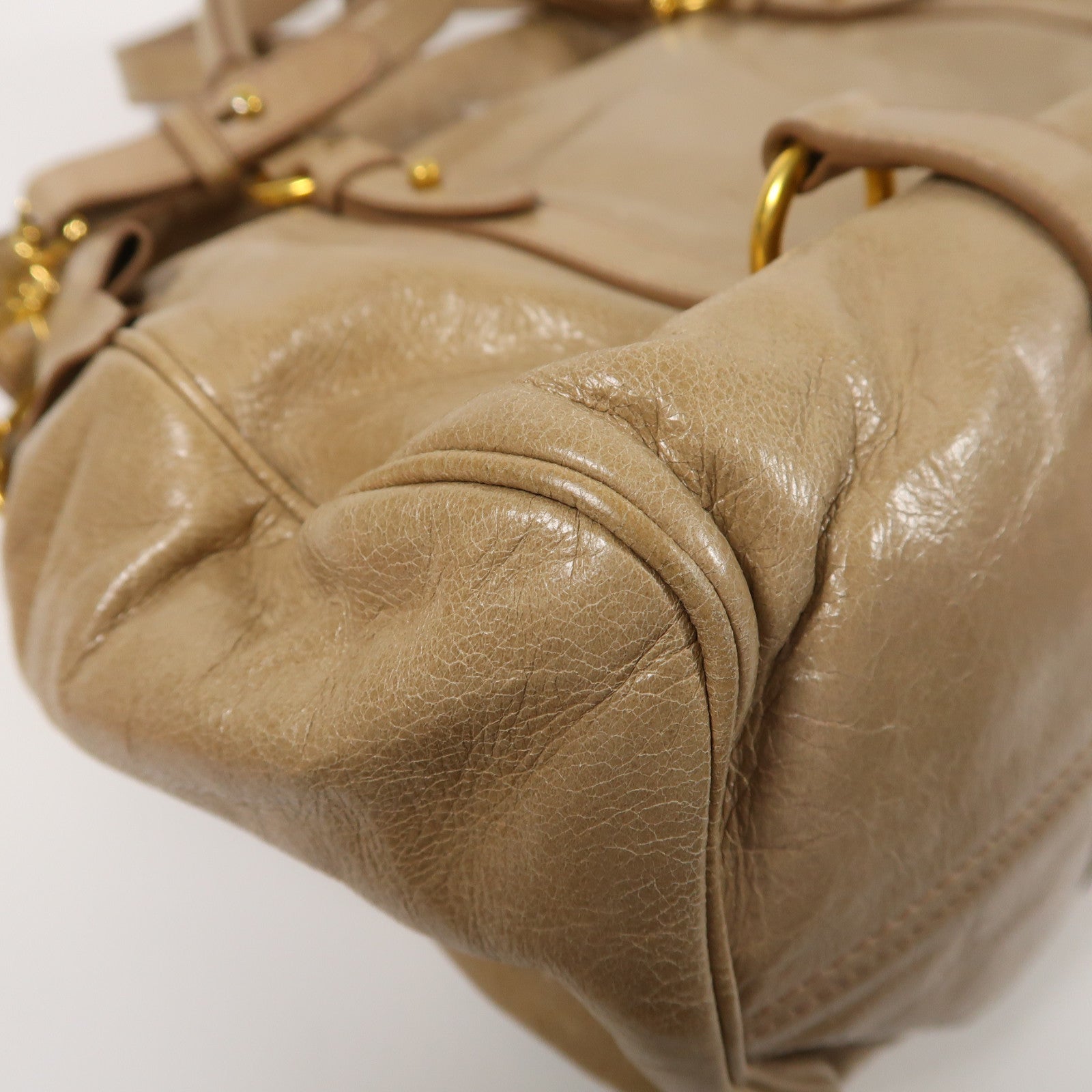 Miu Miu 牛皮皮革Vitello Lux金扣肩背袋棕色