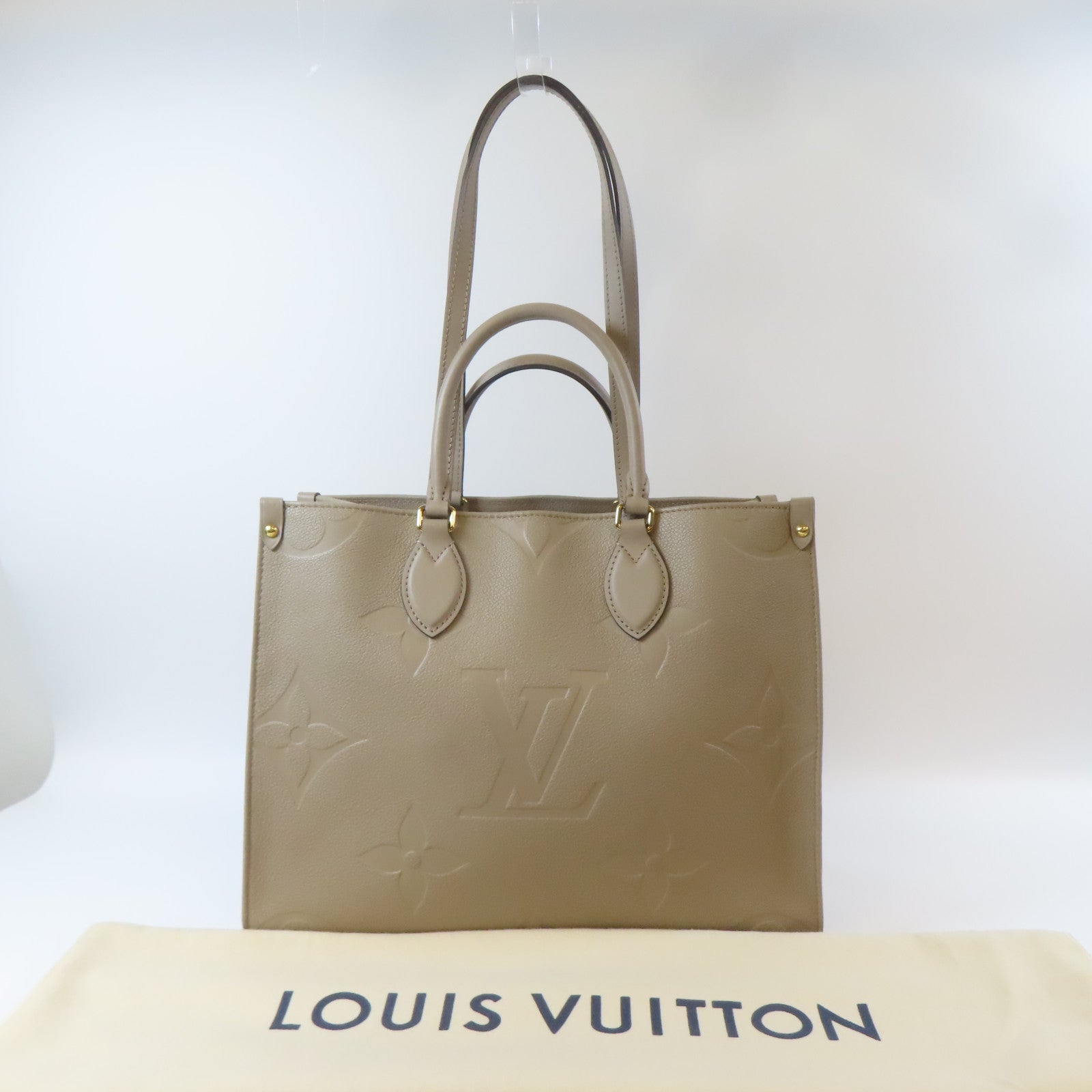 LOUIS VUITTON Monogram Empreinte OnTheGo MM金扣手挽肩背兩用袋米色