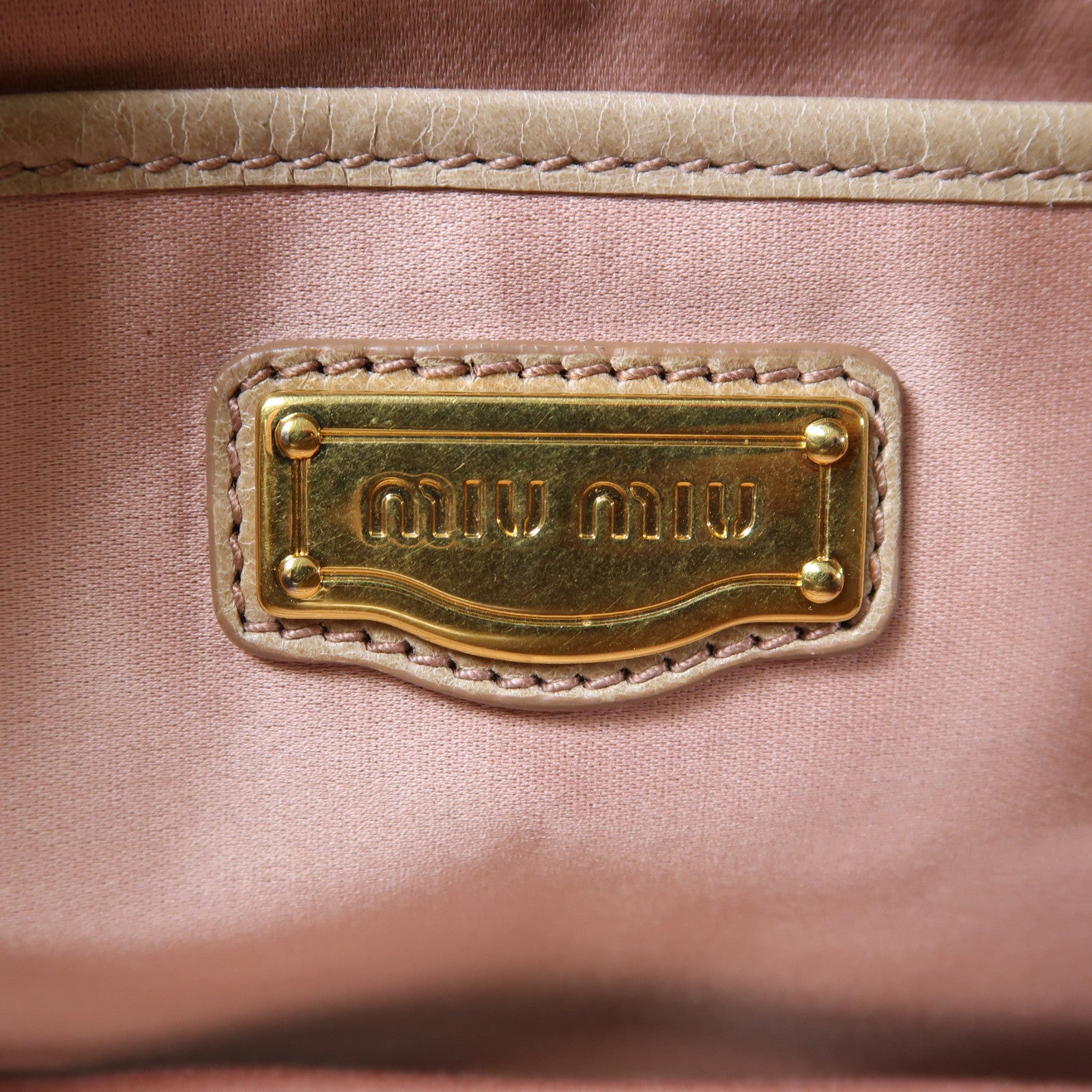 Miu Miu 牛皮皮革Vitello Lux金扣肩背袋棕色