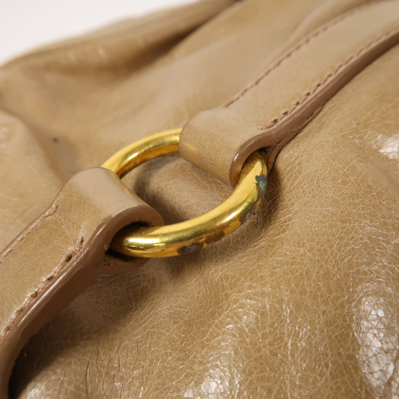 Miu Miu 牛皮皮革Vitello Lux金扣肩背袋棕色