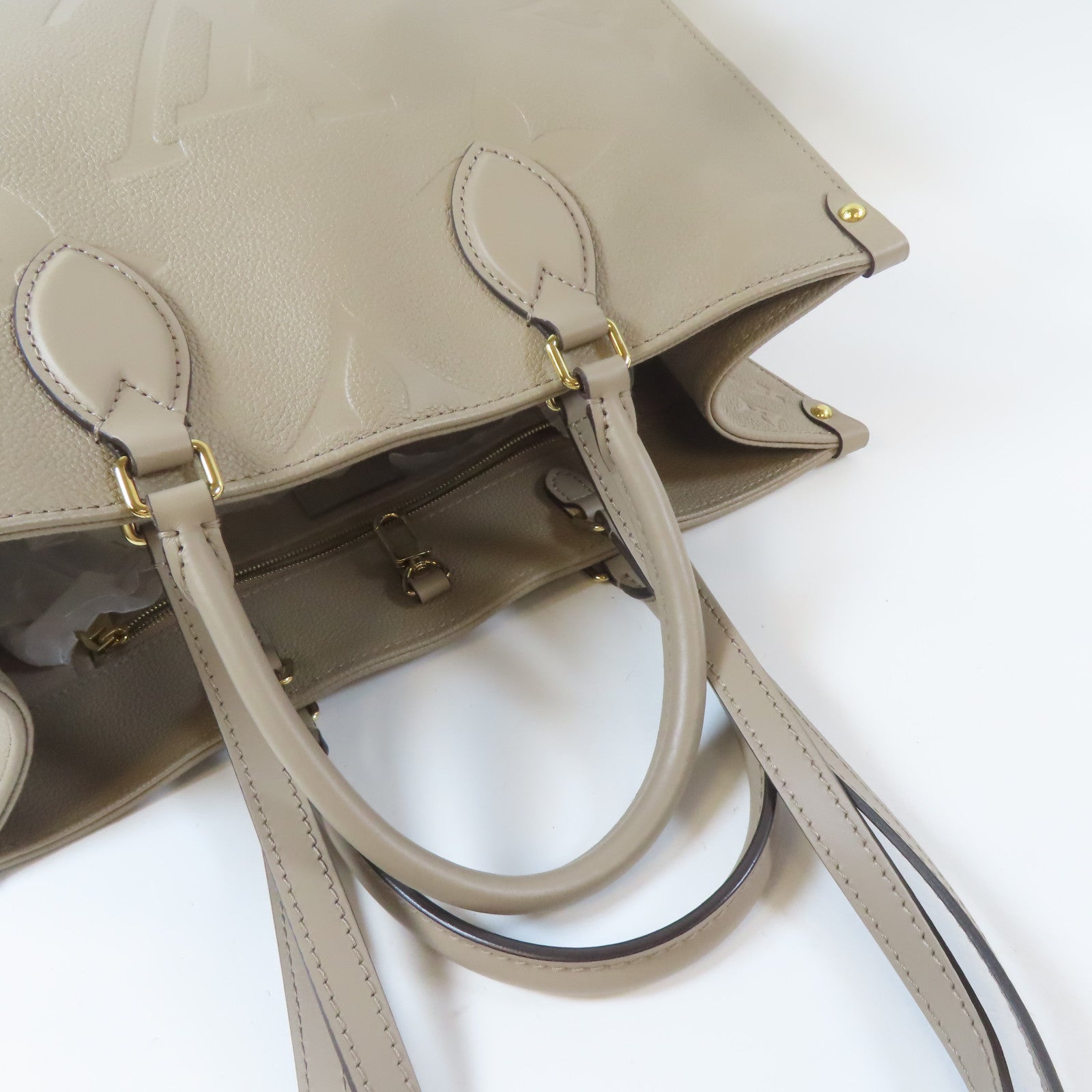 LOUIS VUITTON Monogram Empreinte OnTheGo MM金扣手挽肩背兩用袋米色