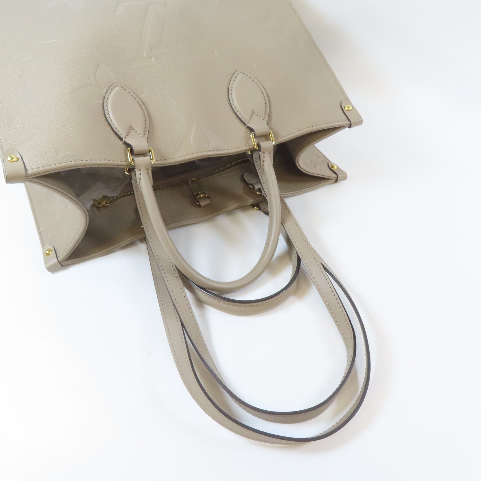 LOUIS VUITTON Monogram Empreinte OnTheGo MM金扣手挽肩背兩用袋米色