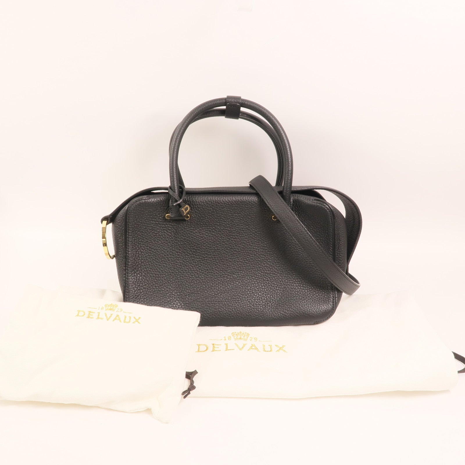 Delvaux 牛皮皮革Cool Box MM金扣手挽肩背兩用袋