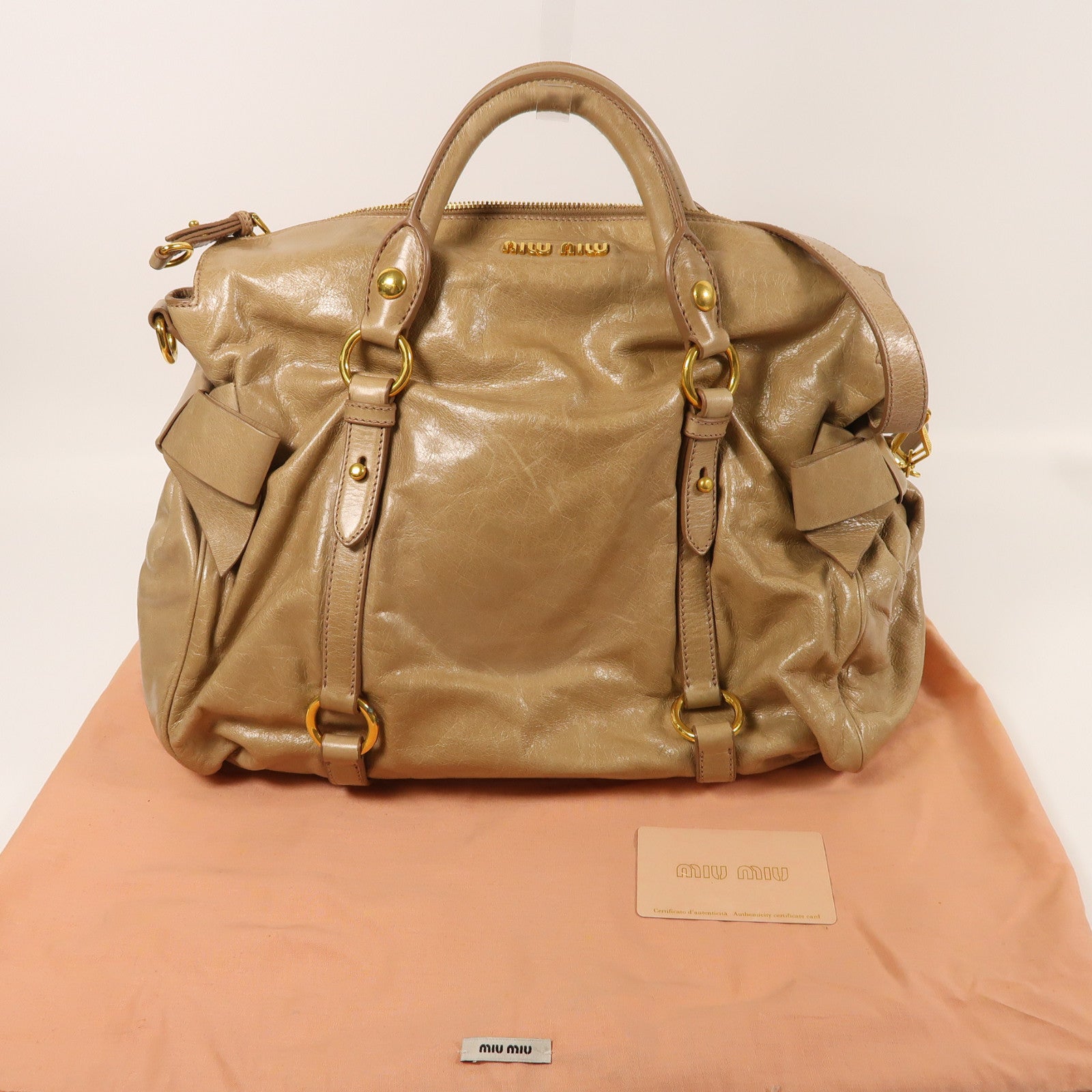 Miu Miu 牛皮皮革Vitello Lux金扣肩背袋棕色