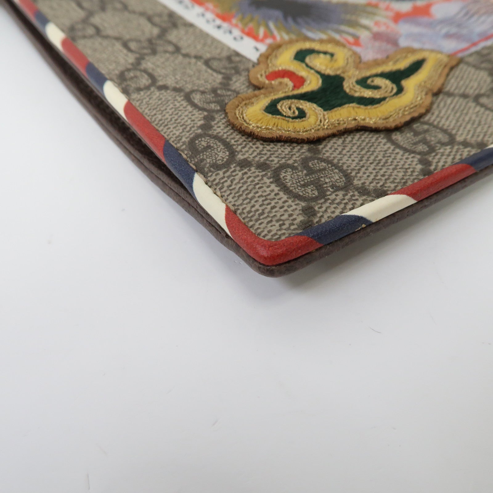 GUCCI 塗層帆布GG Supreme Clutch Bag金扣手拿包啡色