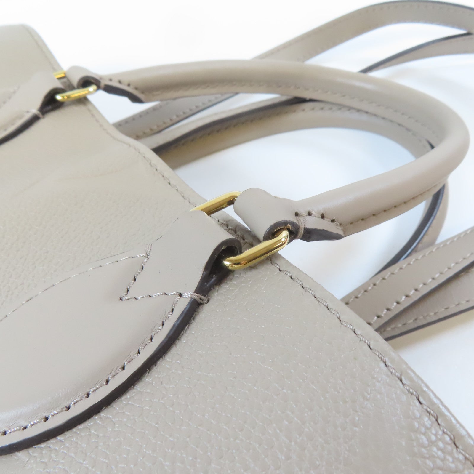 LOUIS VUITTON Monogram Empreinte OnTheGo MM金扣手挽肩背兩用袋米色