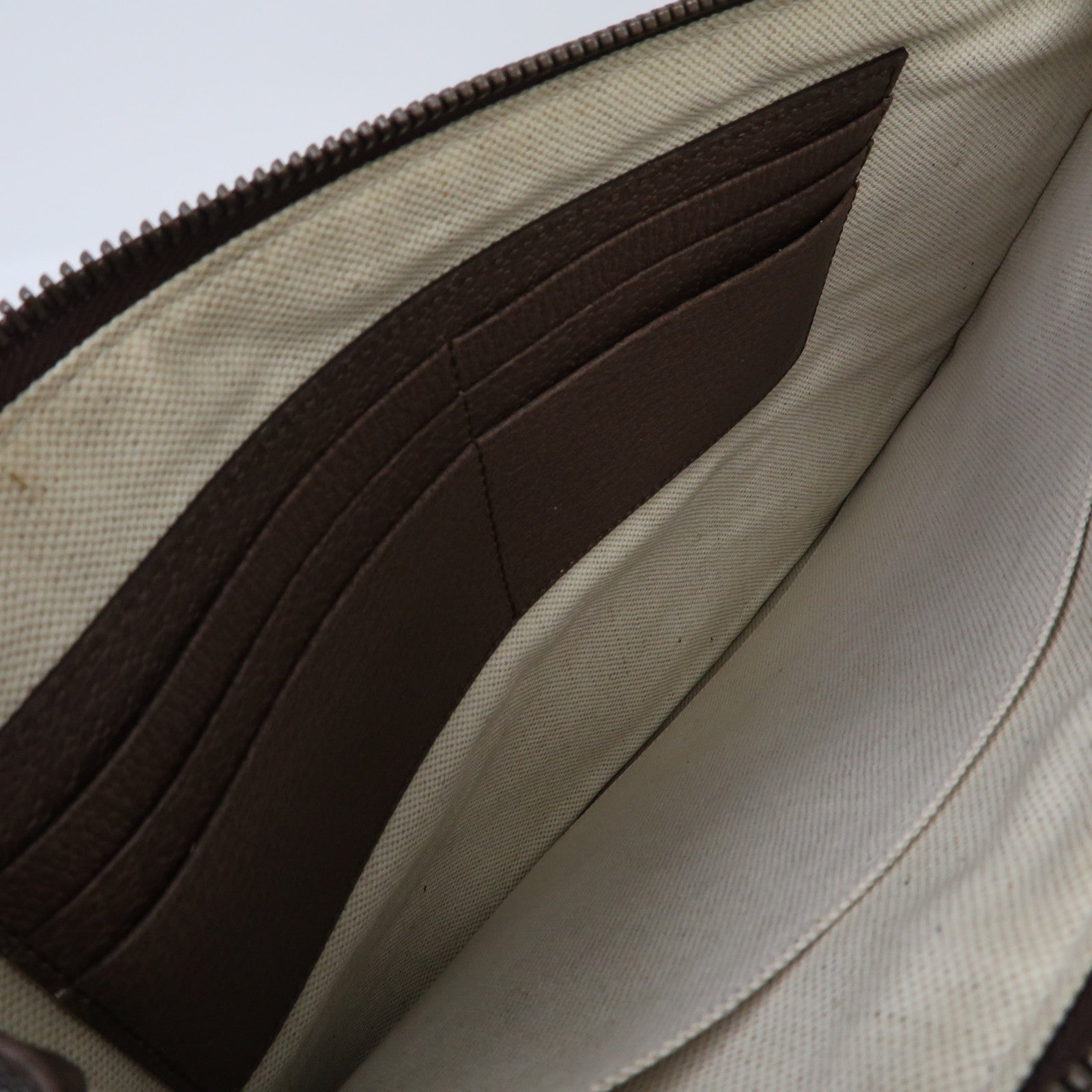 GUCCI 塗層帆布GG Supreme Clutch Bag金扣手拿包啡色