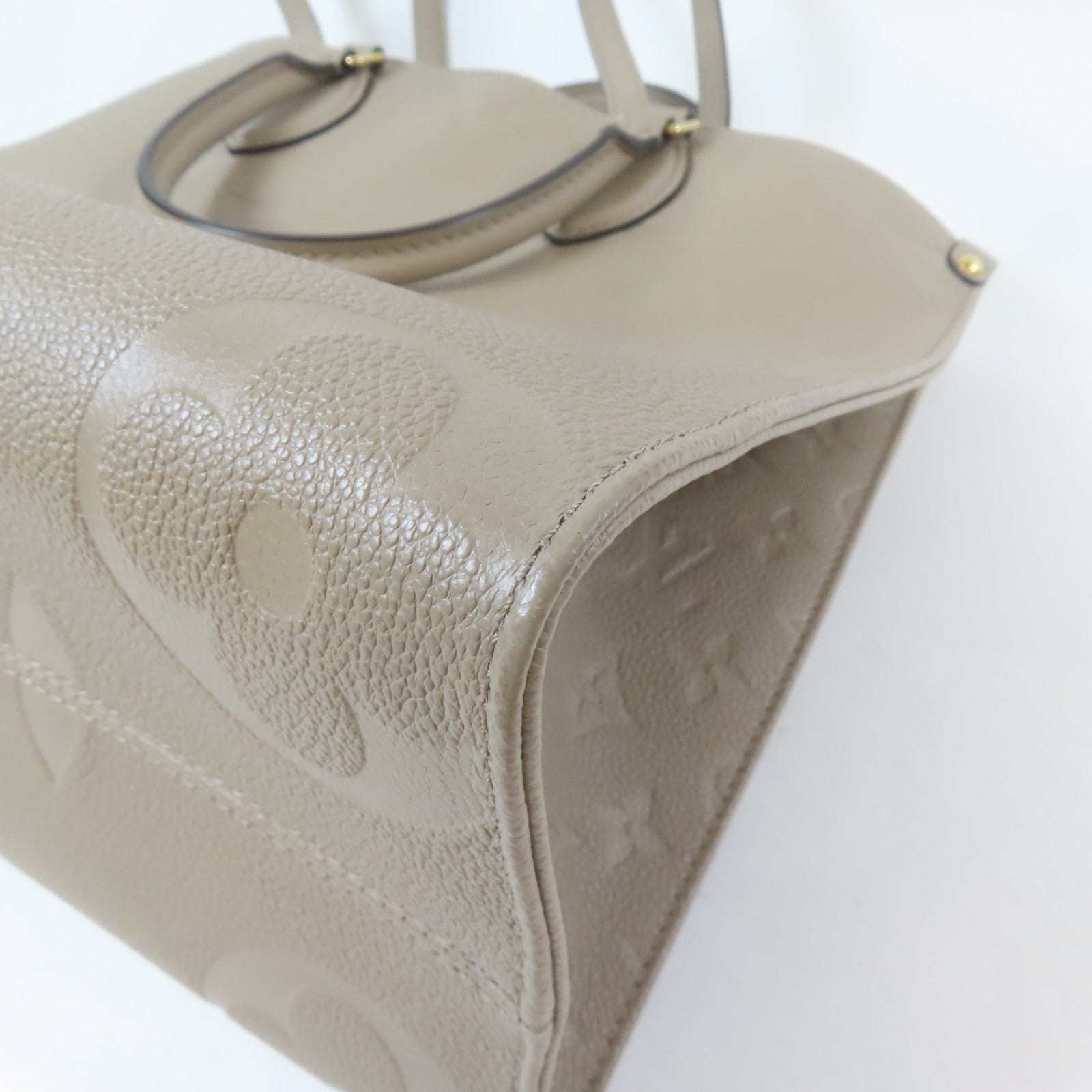 LOUIS VUITTON Monogram Empreinte OnTheGo MM金扣手挽肩背兩用袋米色