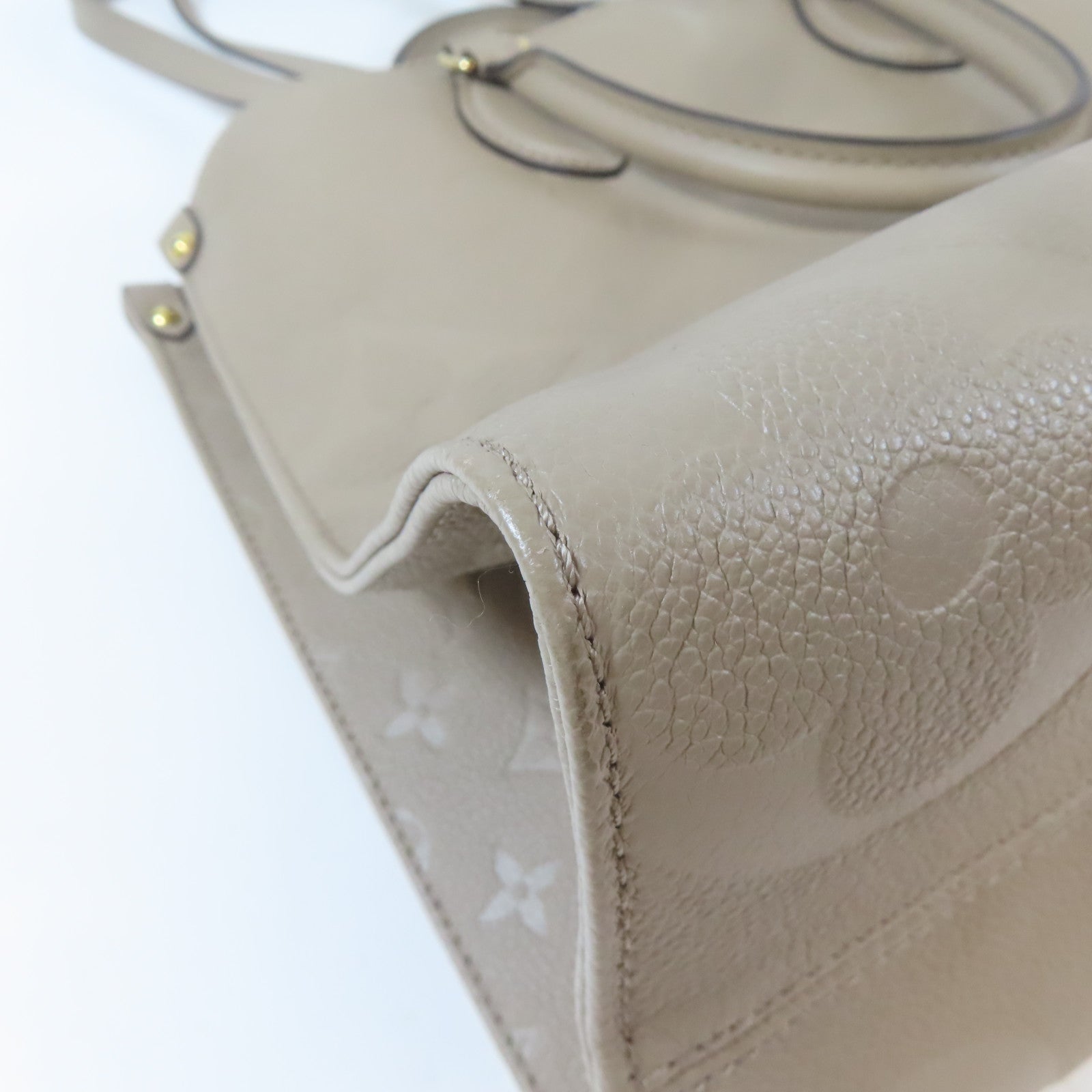 LOUIS VUITTON Monogram Empreinte OnTheGo MM金扣手挽肩背兩用袋米色