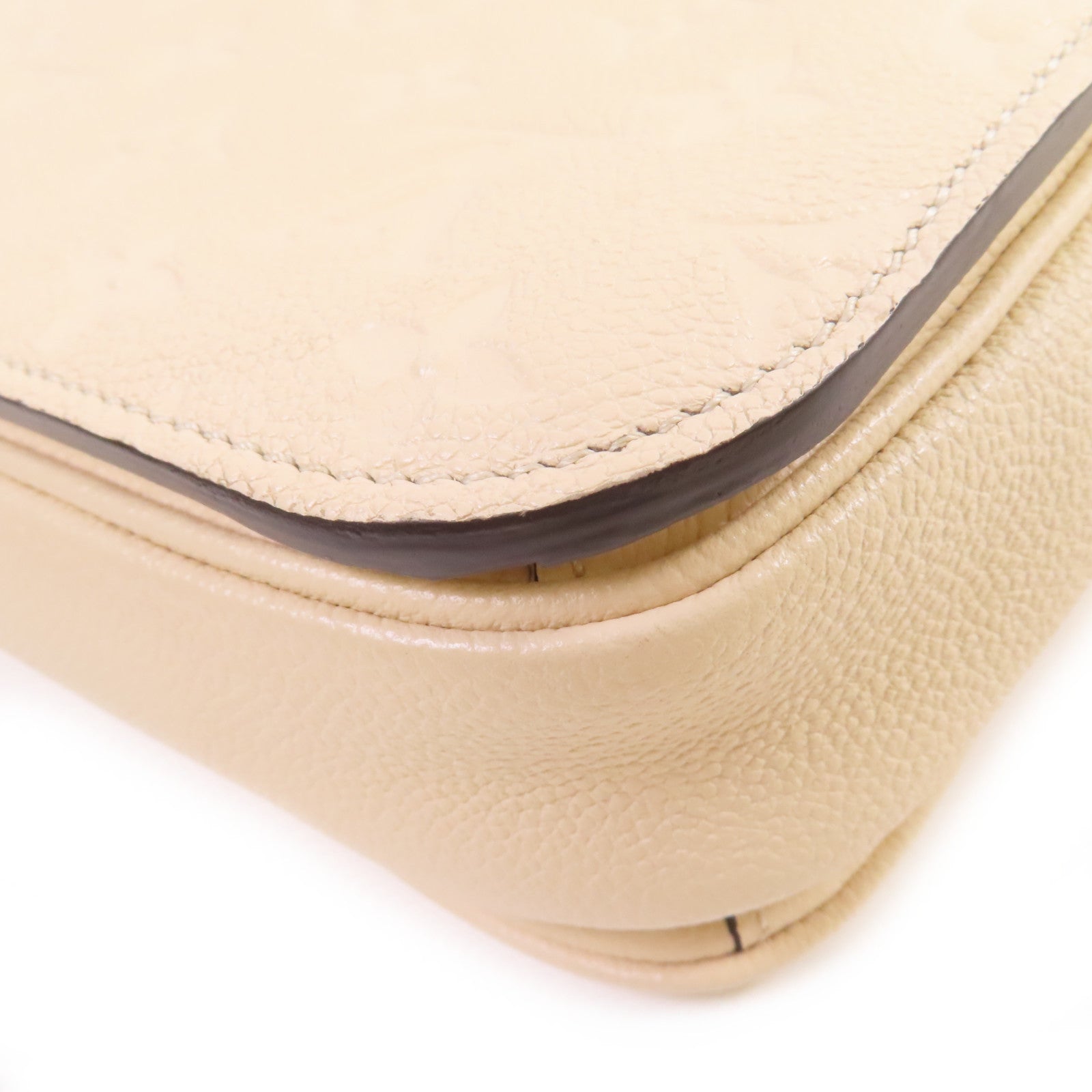 LOUIS VUITTON Monogram Empreinte Pochette Metis金扣手挽肩背兩用袋米色