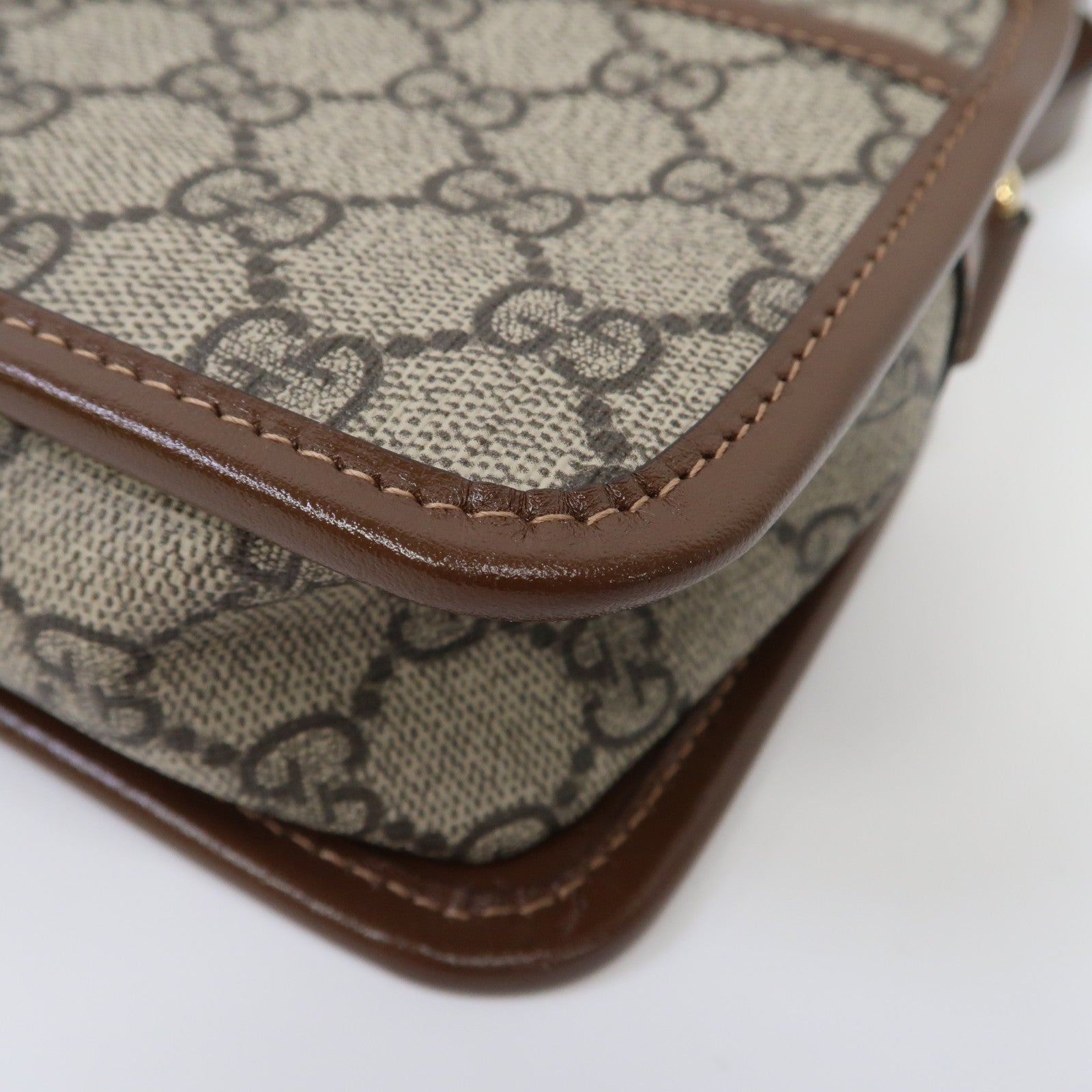 GUCCI 塗層帆布Mini Interlocking G金扣肩背袋啡色
