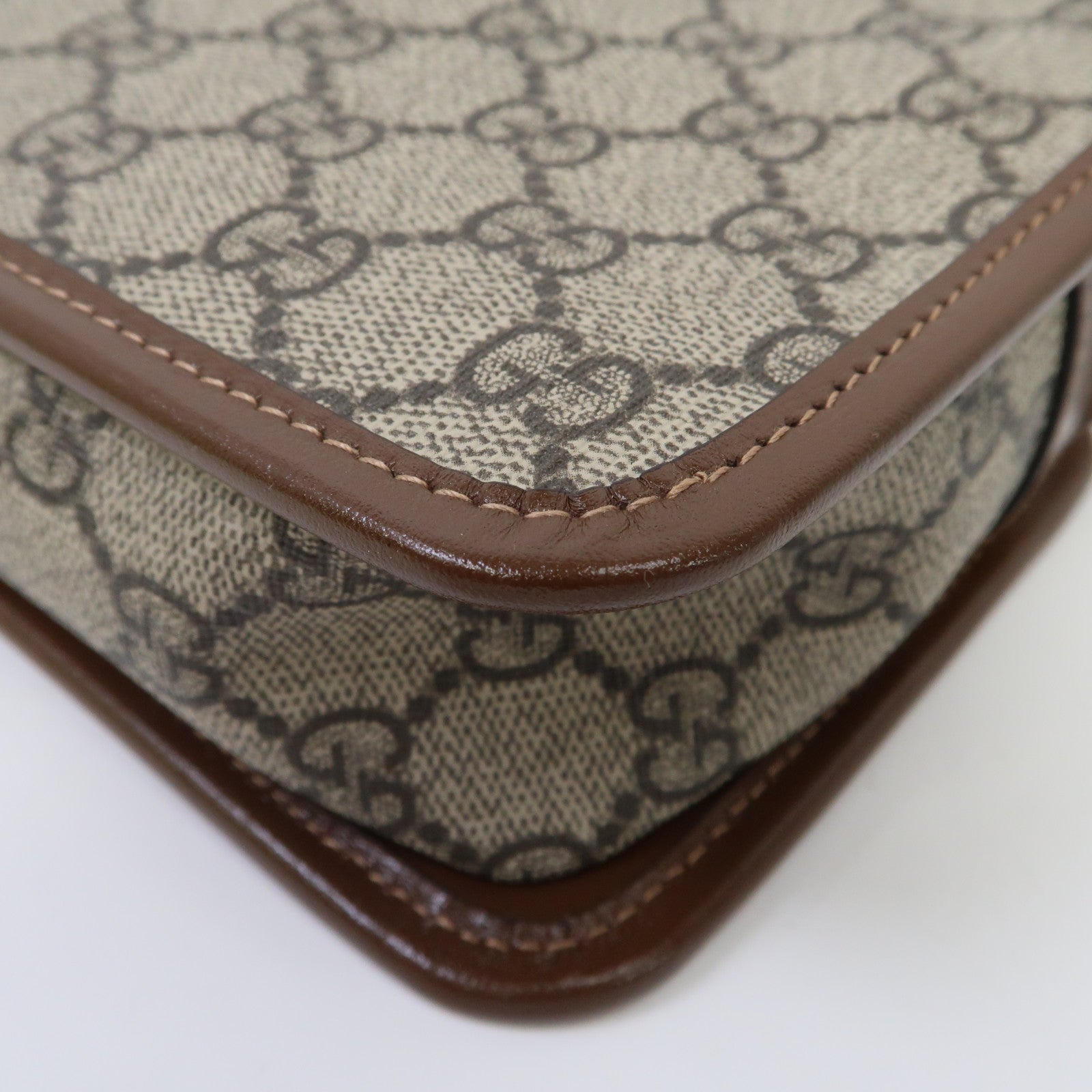 GUCCI 塗層帆布Mini Interlocking G金扣肩背袋啡色