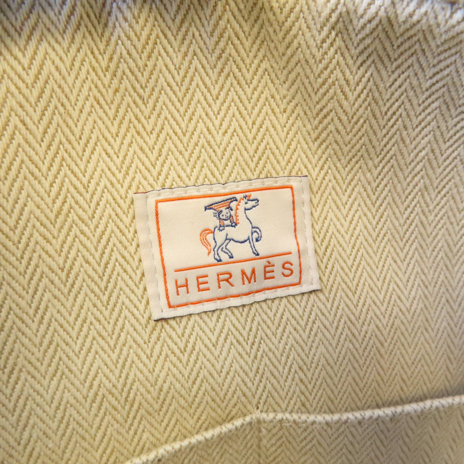 HERMES 帆布Bride A Brac Cabriole Case銀扣手挽袋米色/藍色