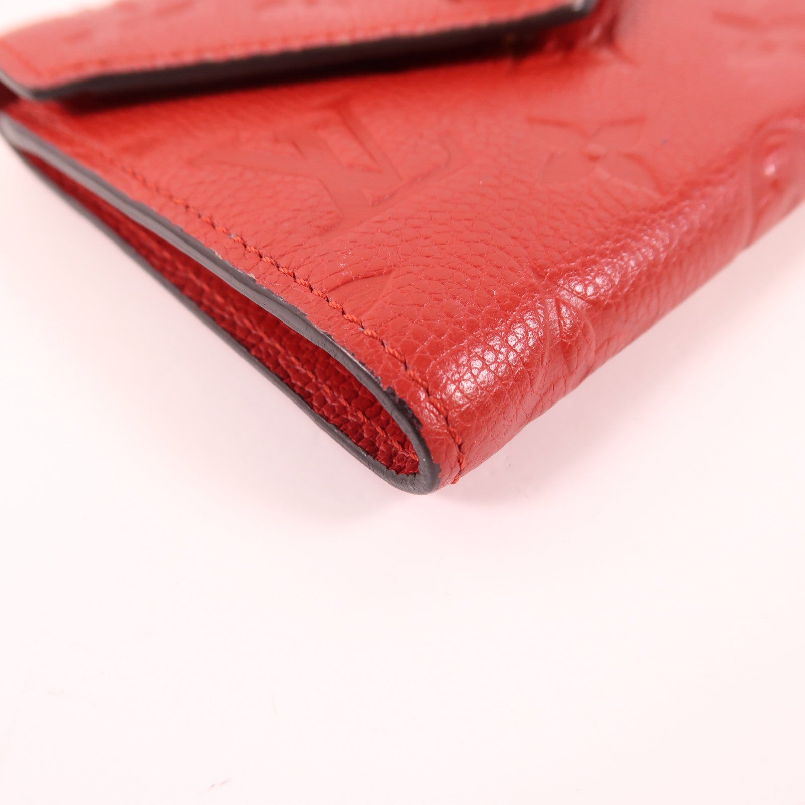 LOUIS VUITTON LV GHW Victorine Tri-fold Wallet Monogram Empreinte Red