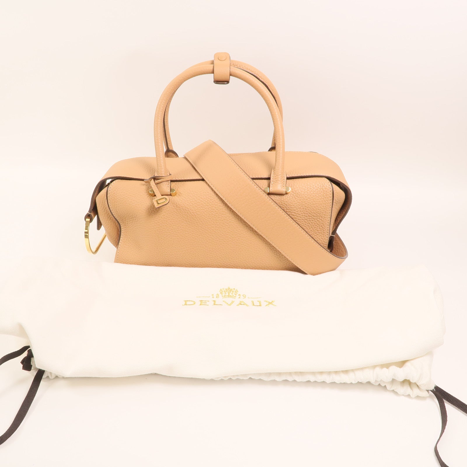 Delvaux 牛皮皮革Cool Box MM金扣手挽肩背兩用袋