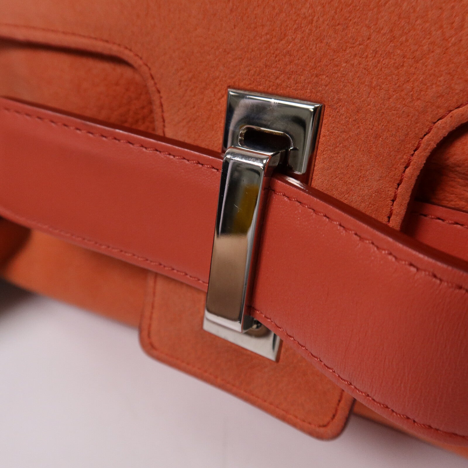 Delvaux 牛皮皮革Simplissime City銀扣肩背袋
