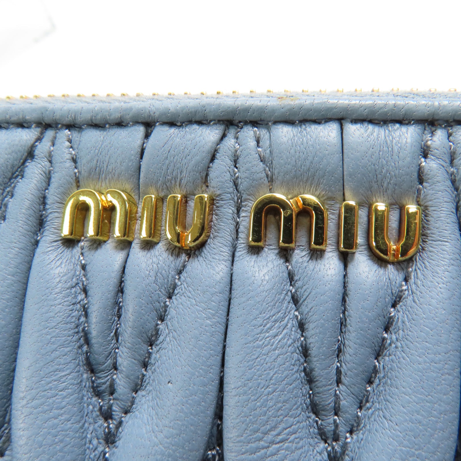 Miu Miu 【激減優惠】羊皮皮革Pouch金扣手拿包