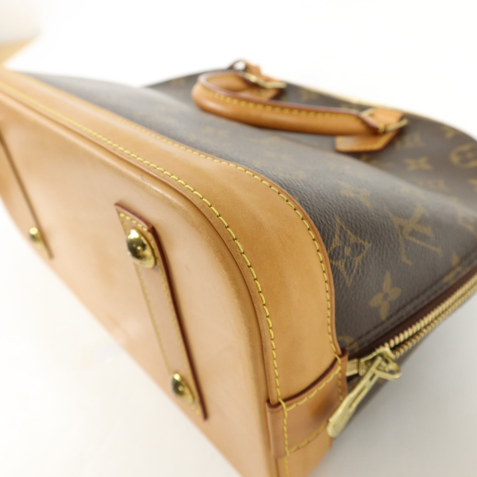 LOUIS VUITTON Monogram Alma金扣手挽袋棕色