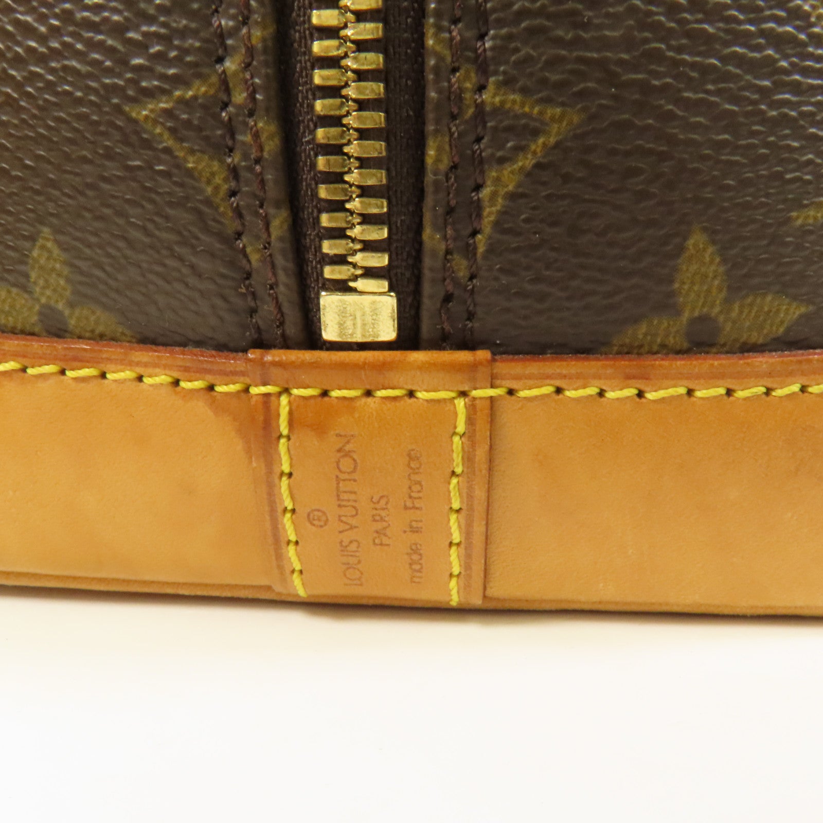 LOUIS VUITTON Monogram Alma金扣手挽袋棕色
