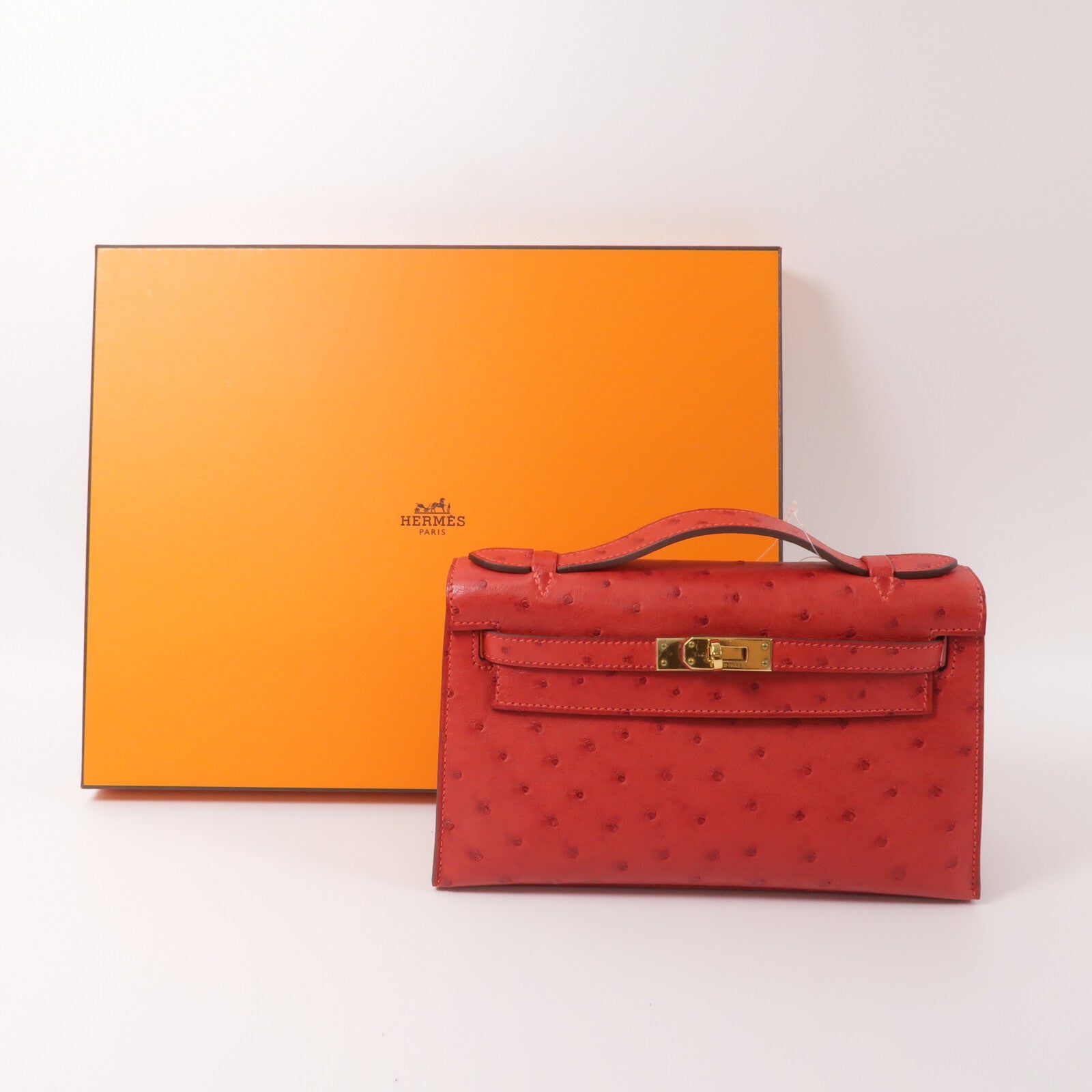 HERMES 鴕鳥皮革Kelly Pochette手挽袋Rouge Vif