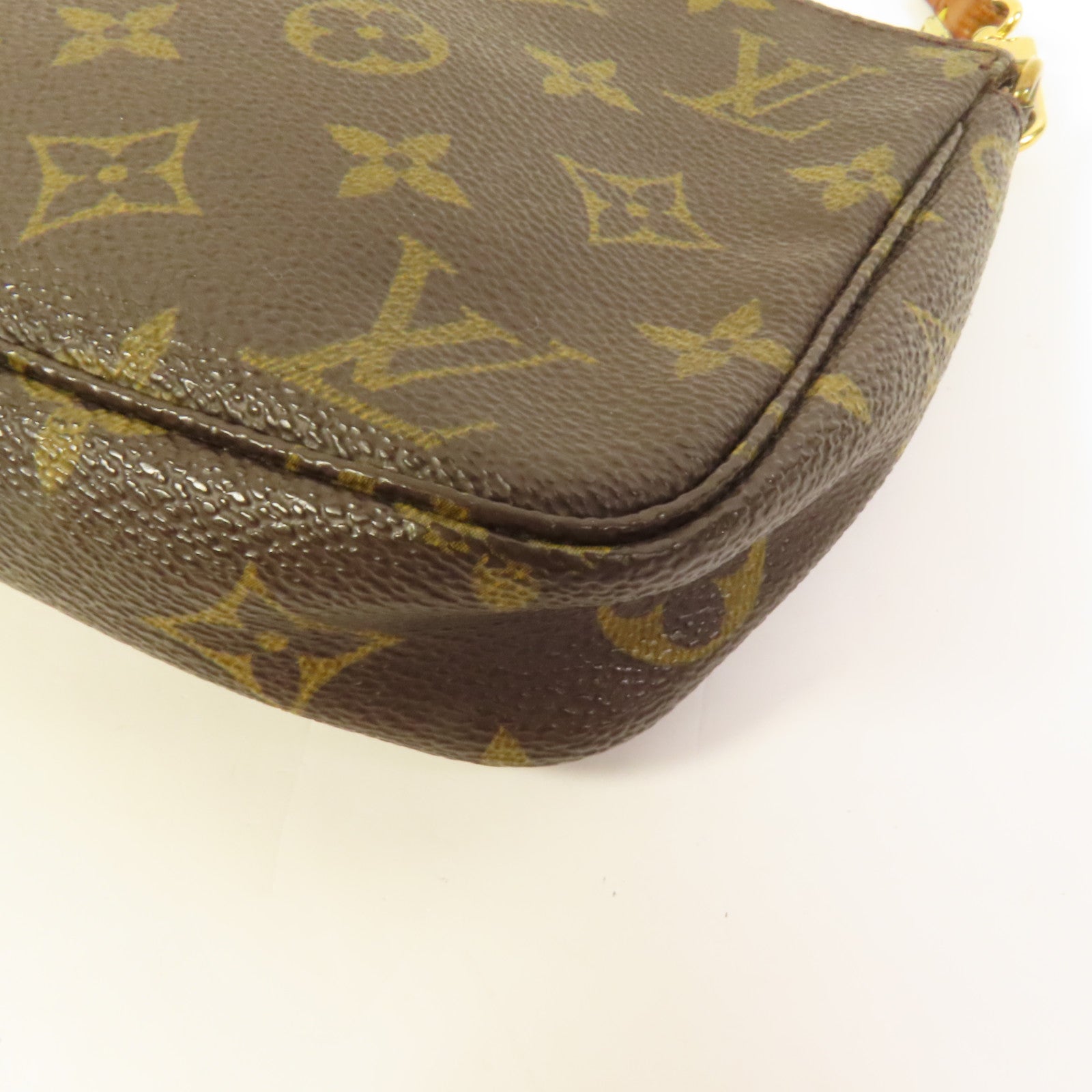 LOUIS VUITTON Monogram Pochette Accessoires金扣手挽袋棕色