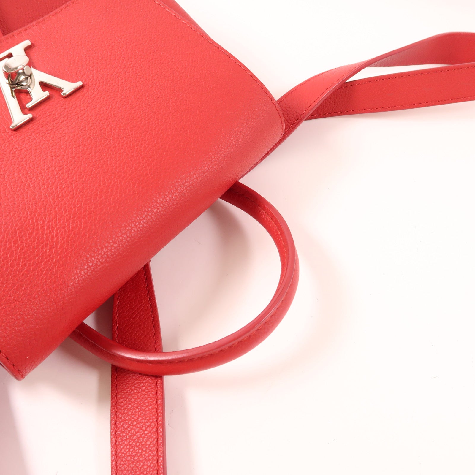LOUIS VUITTON 牛皮皮革Lockme Backpack銀扣背包紅色