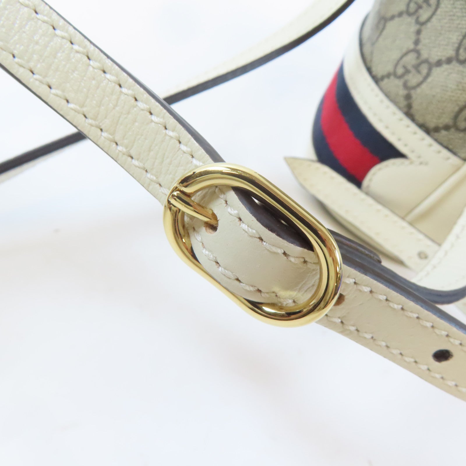 GUCCI 塗層帆布Ophidia GG Mini Bucket金扣肩背袋啡色/白色