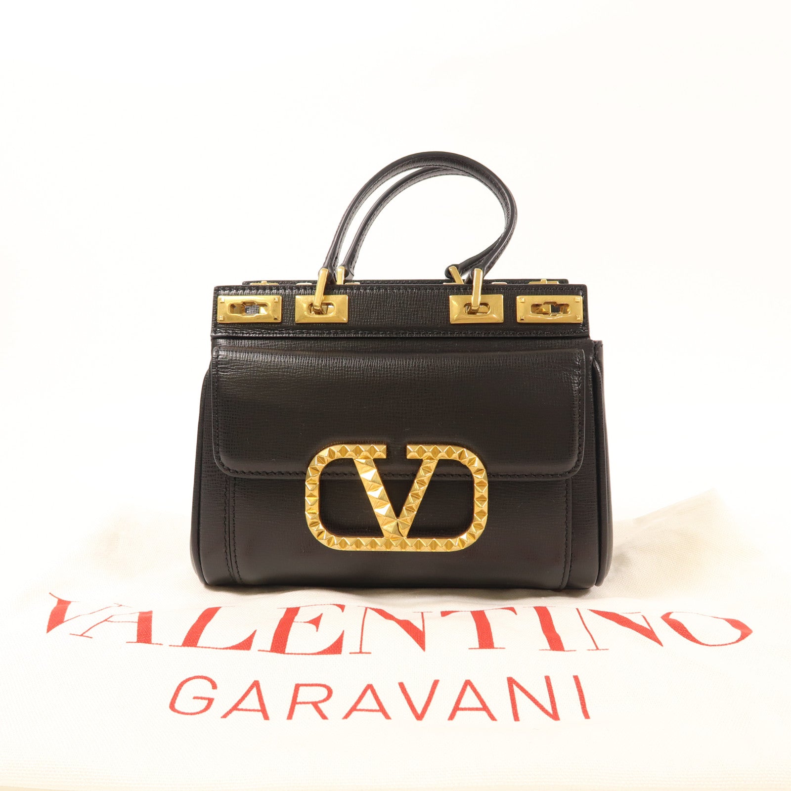 Valentino 牛皮皮革Rockstud Alcove金扣手挽袋