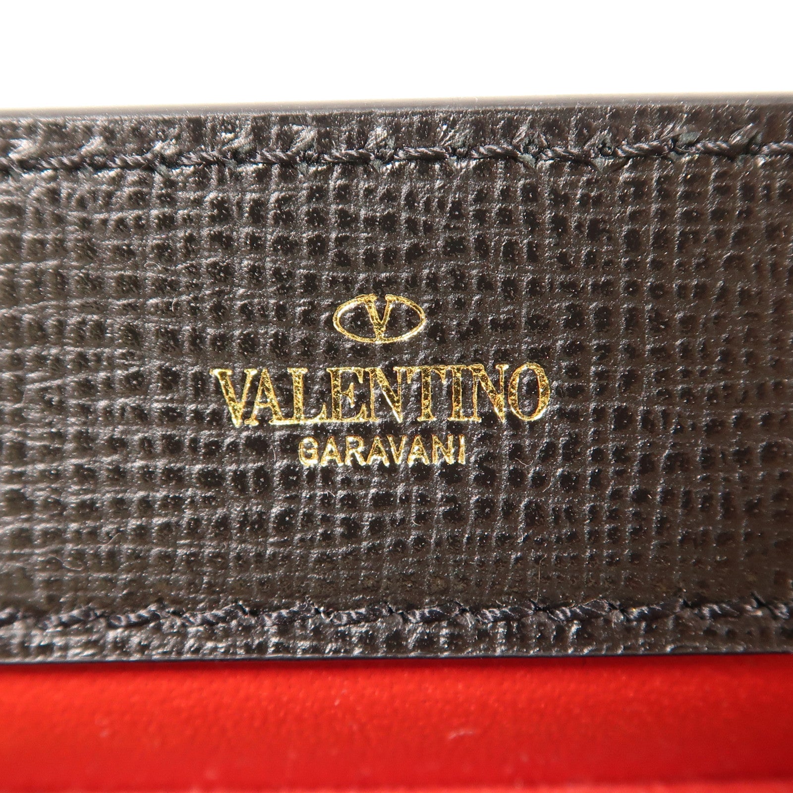 Valentino 牛皮皮革Rockstud Alcove金扣手挽袋